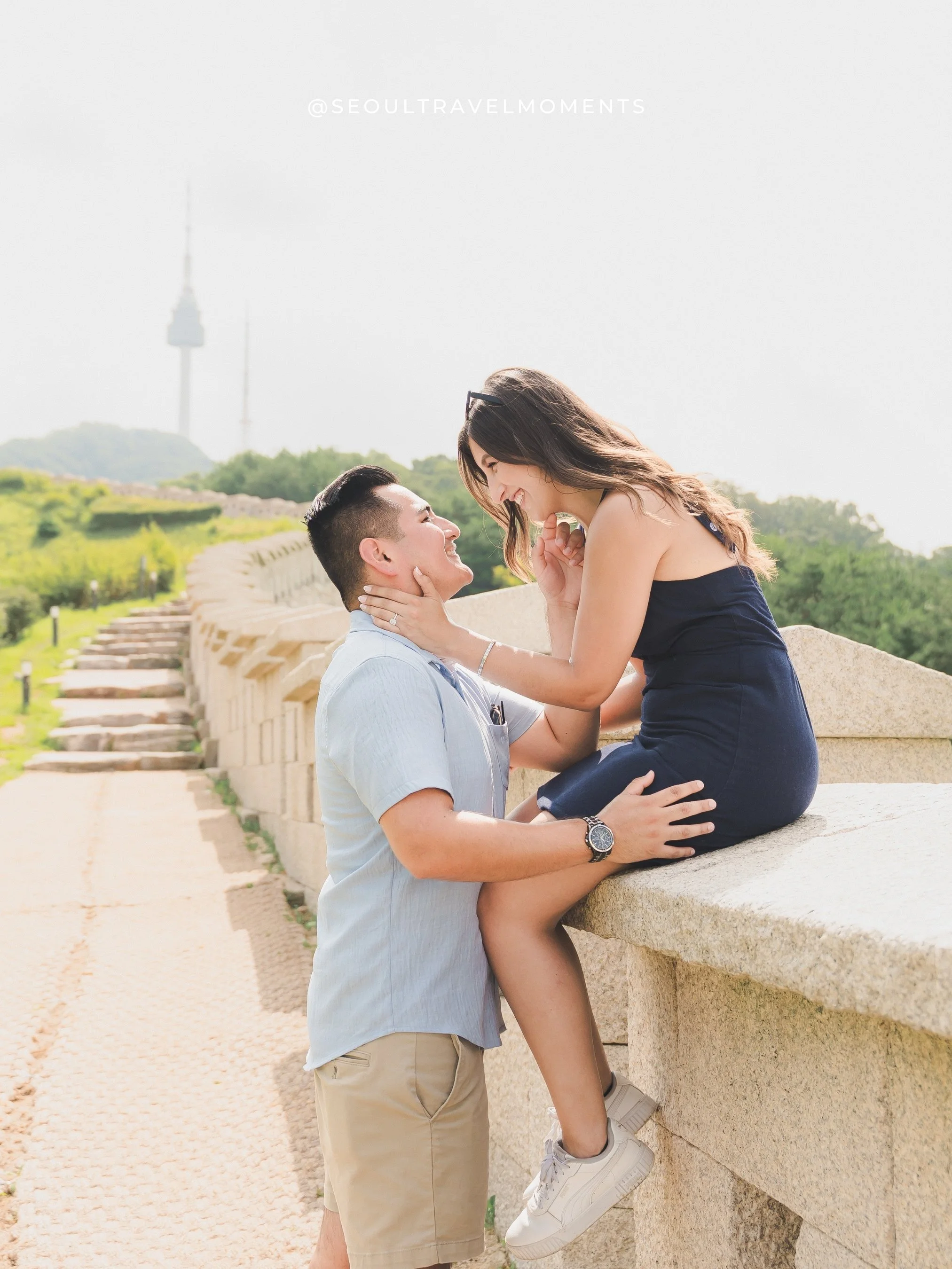 Proposal photoshoot at Namsangol Hanok Village in Seoul, capturing a couple during a traditional hanok engagement moment.