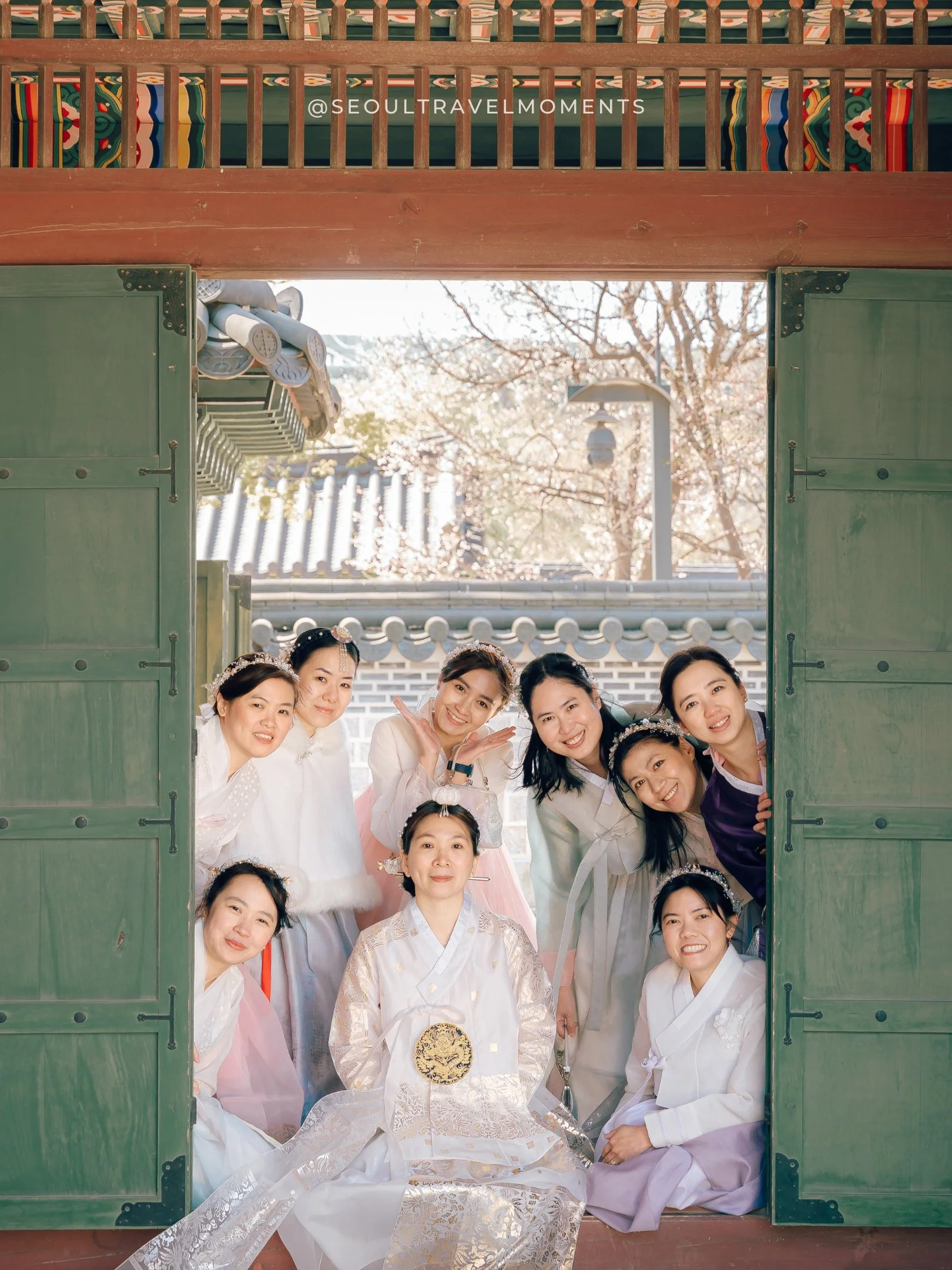 playful group of friends in hanbok during a photoshoot in seoul