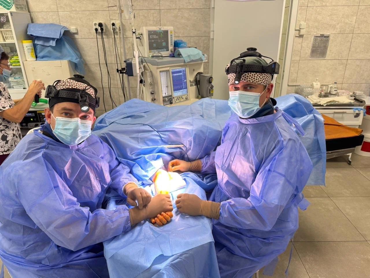 Surgical headlights in use.