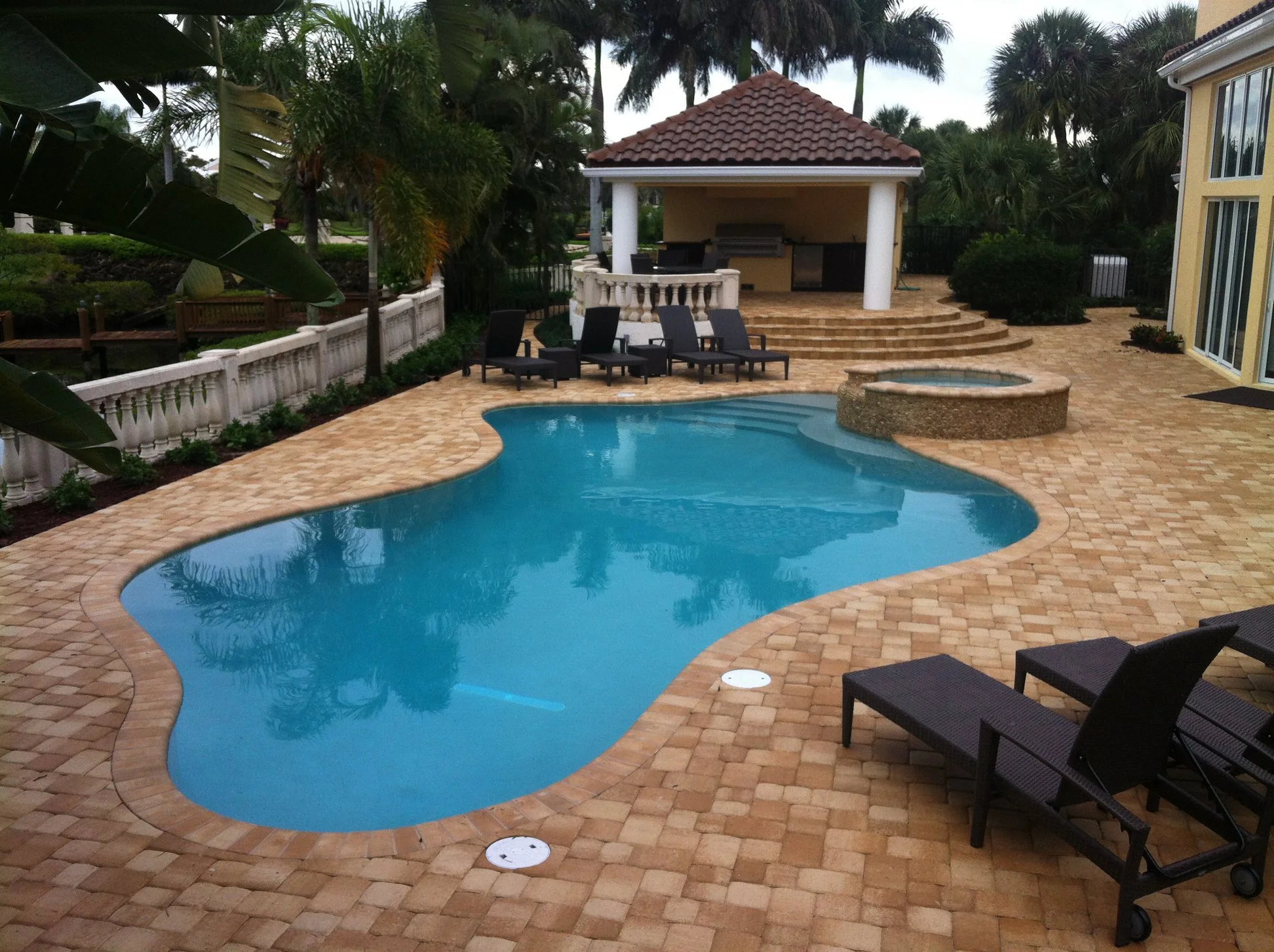 freeform pool with gazebo in Admiorals Cove.jpg