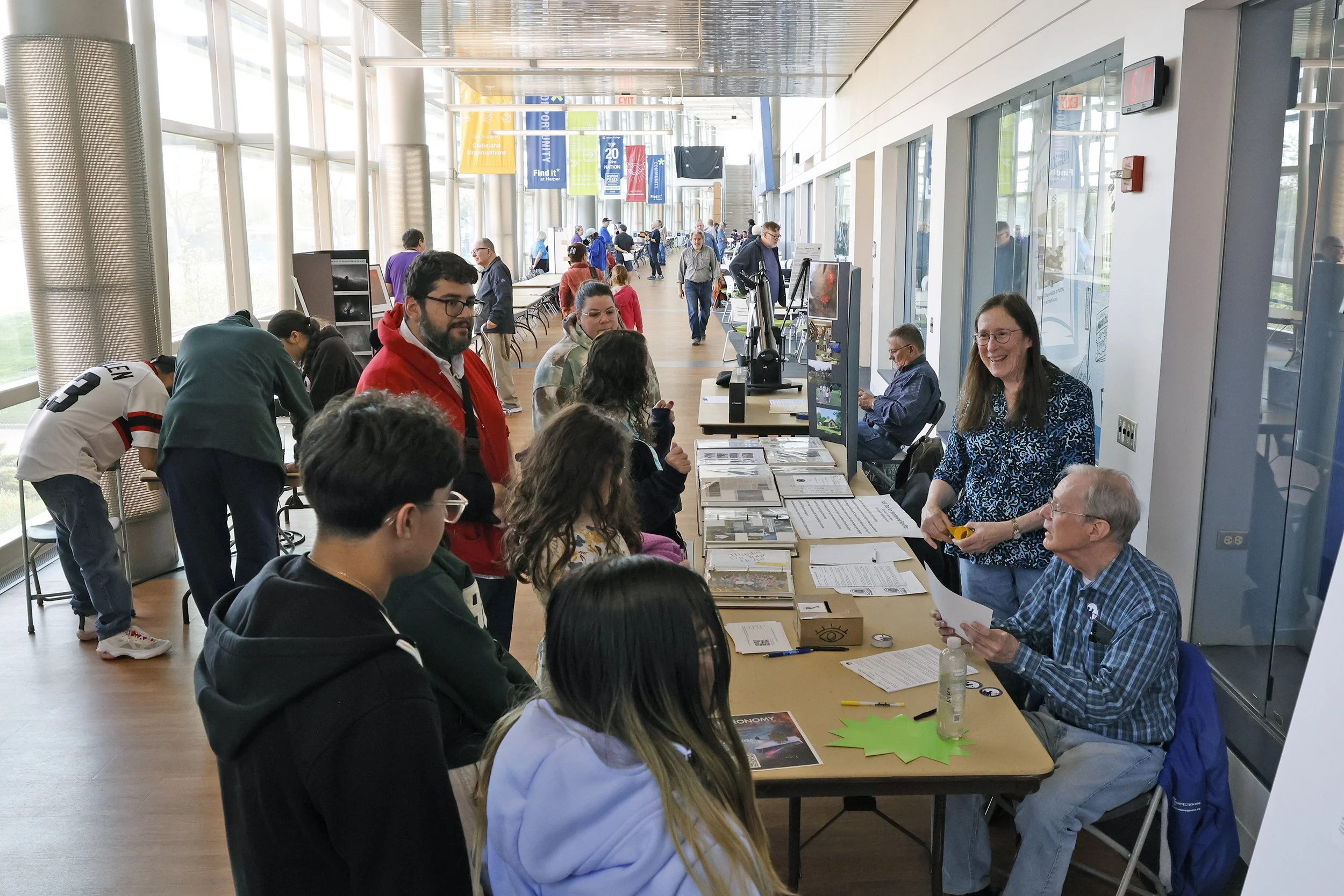 Edith Auchter greets Astronomy Day attendees.jpg