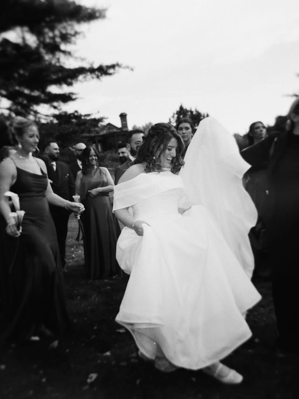 bride walking with wedding party