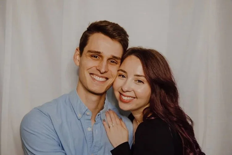 Charlie and Nate smiling at the camera