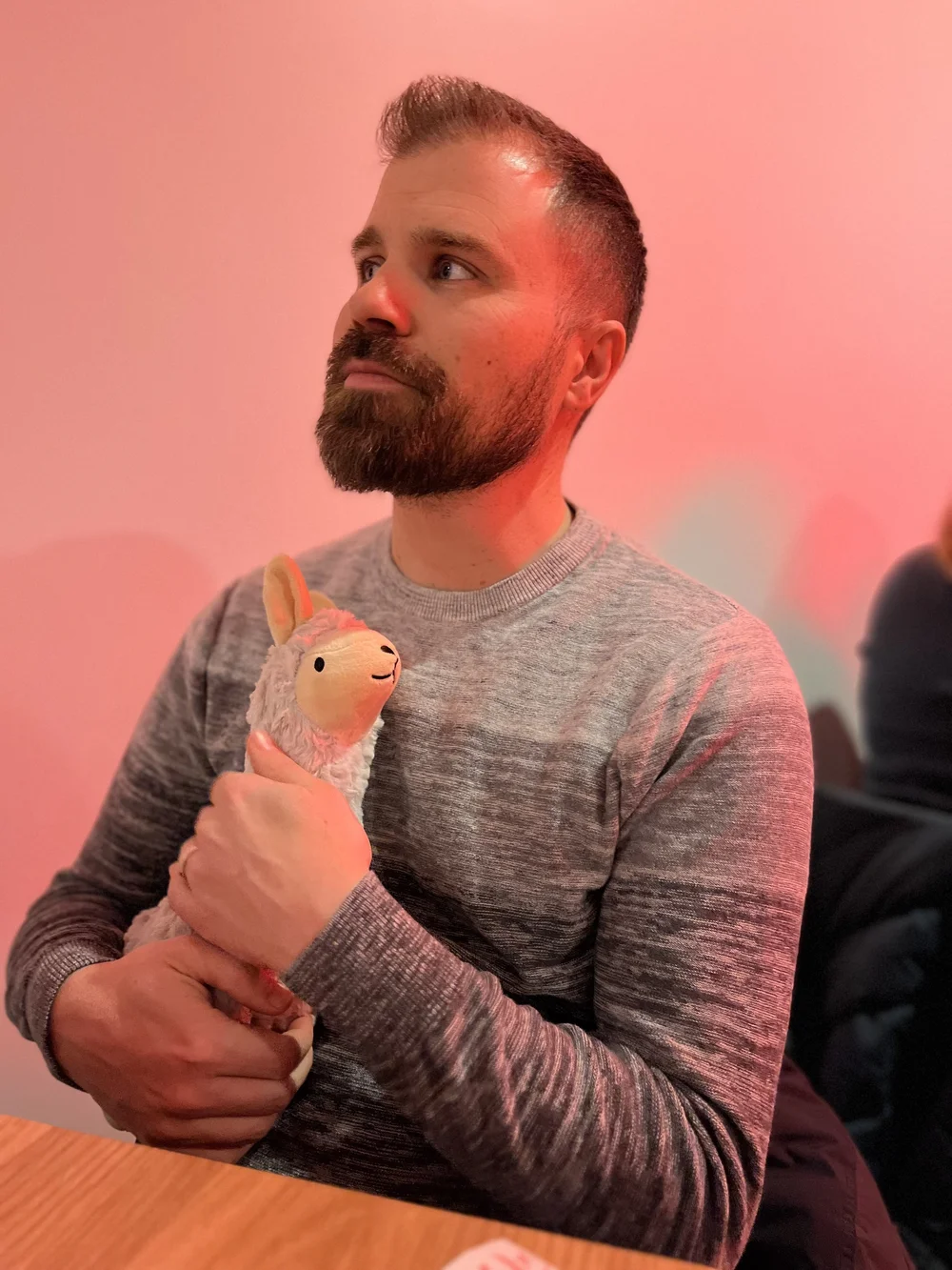 Justin with stuffed animal.jpeg