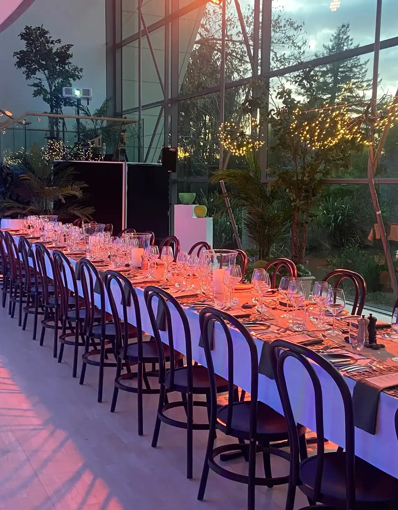 Long white table setting for a catering event