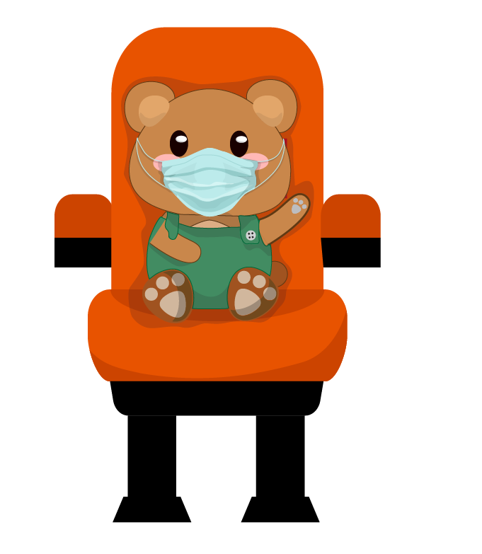 Corduroy bear, masked, sitting in a theatre chair