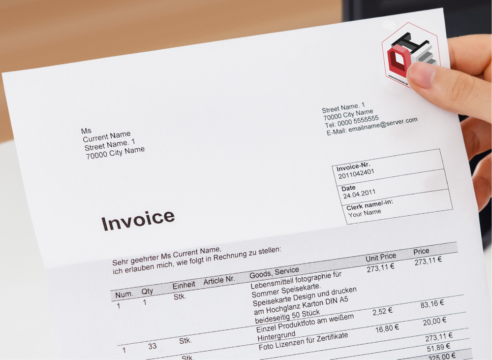 An invoice mockup with an abbreviated logo in the right-hand corner