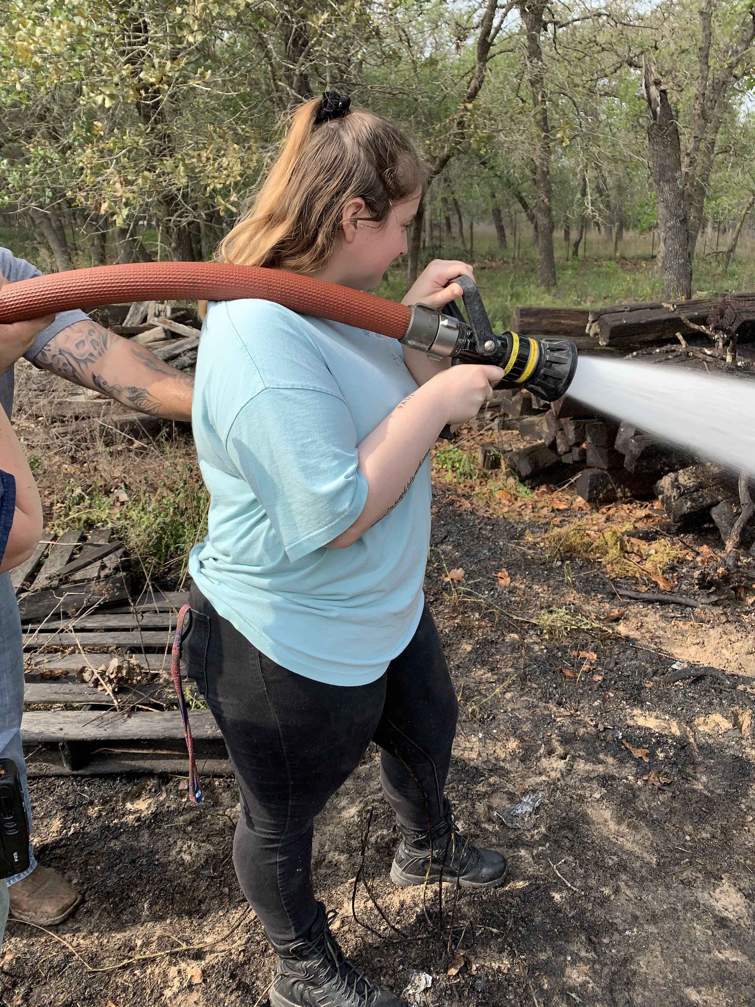 Cheyenne Hallmark performing mop up at a small brush fire.