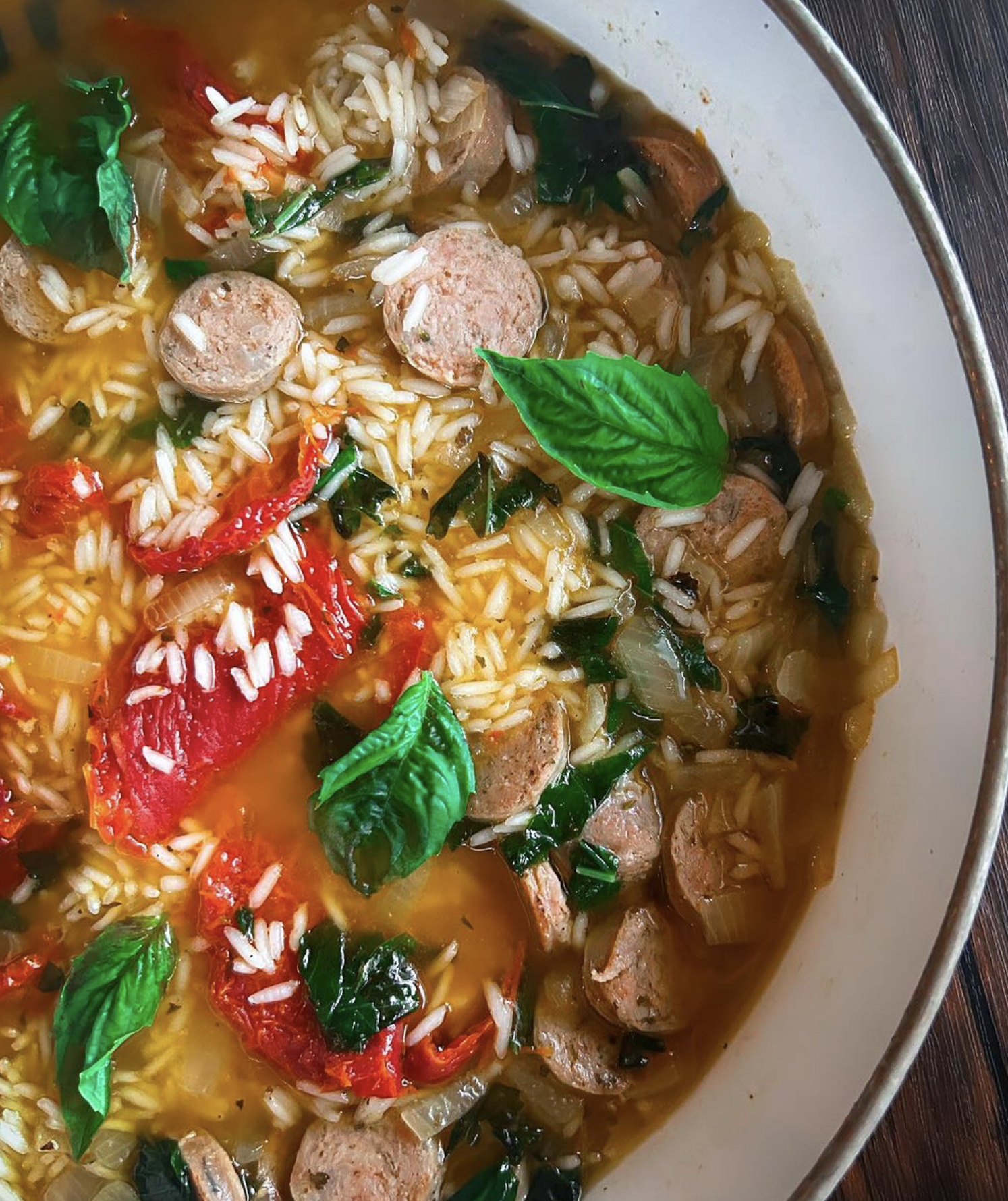 A mouthwatering Italian soup featuring sausage, rice, and sundried tomatoes