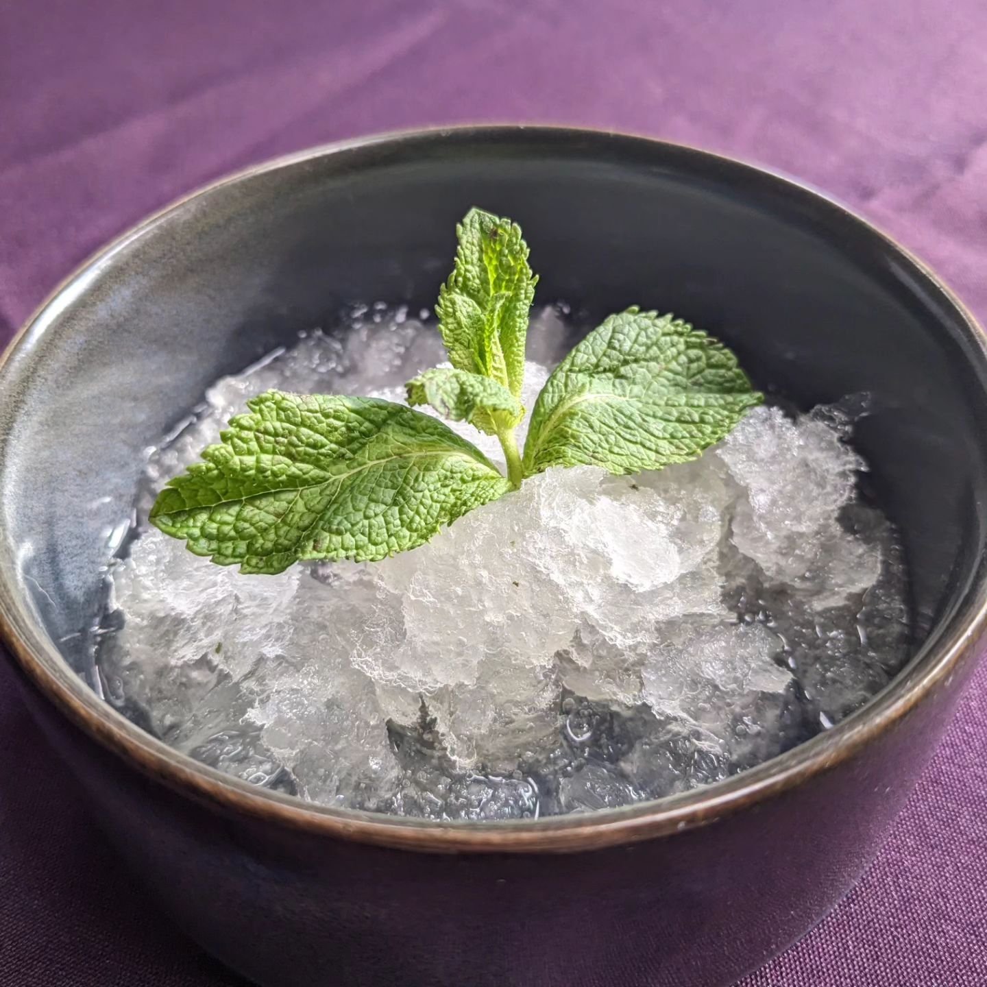Next up is a little palate cleanser courtesy of the winter court. Gin and mint granita. Be warned it's sharp and boozy, but what else would you expect from the queen of air and darkness? Bright, invigorating with sharp defined flavours. Perfect encap