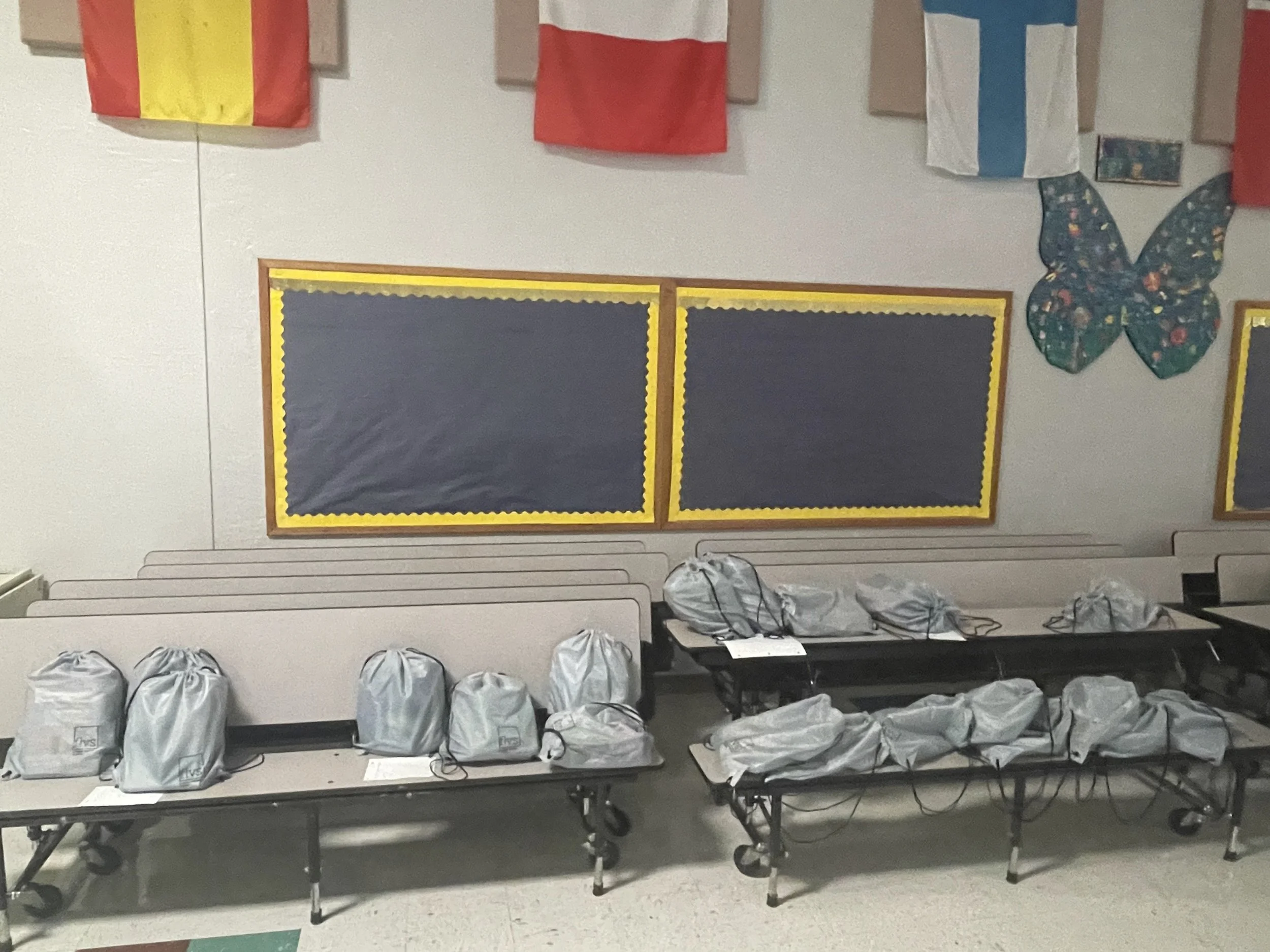 Drawstring backpacks full of supplies