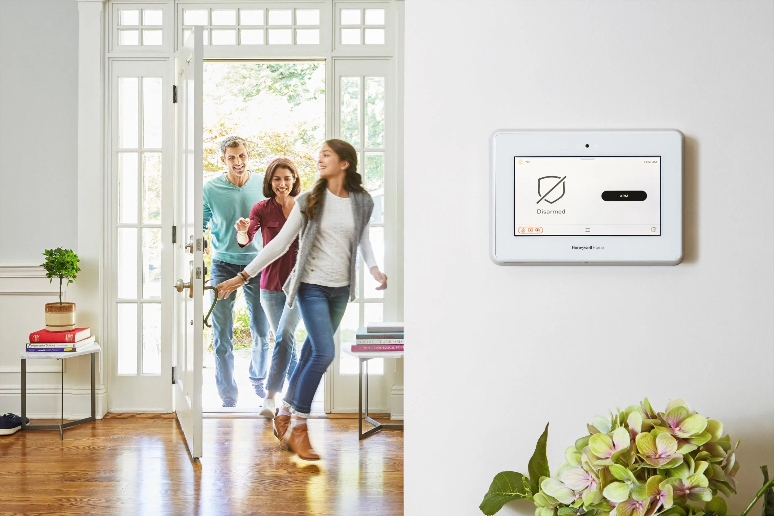 Family-Entering-Home-scaled.jpg