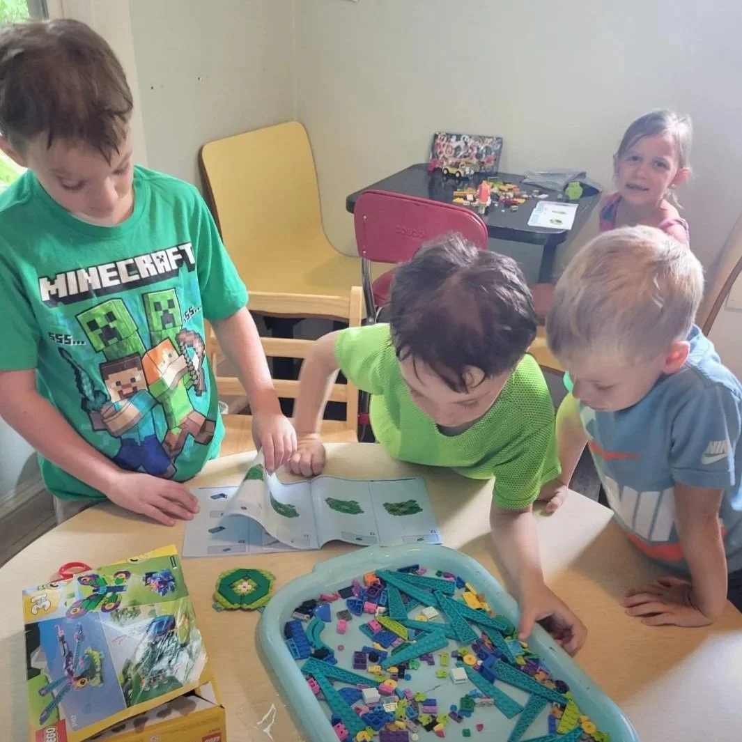 Children creating with Legos for Lego Week at The Great Wide Open Center