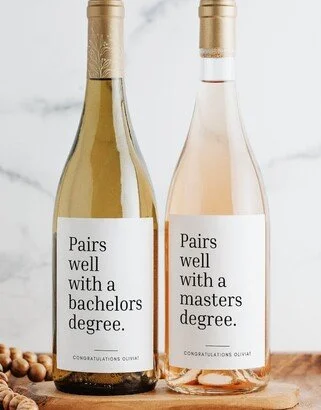 CUSTOM WINE LABEL THAT SAYS " PAIRS WELL WITH A MASTER'S DEGREE"