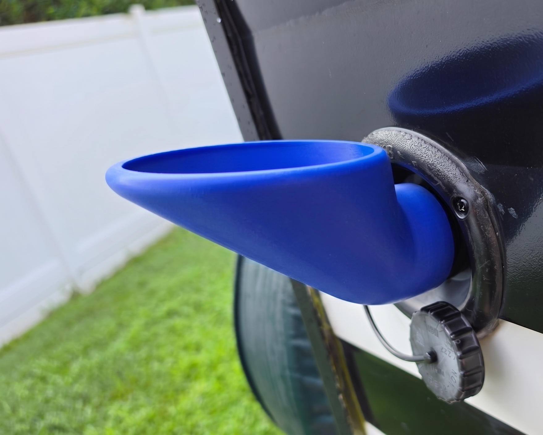 FlowPort funnel used for adding RV antifreeze to a travel trailer fresh water system.