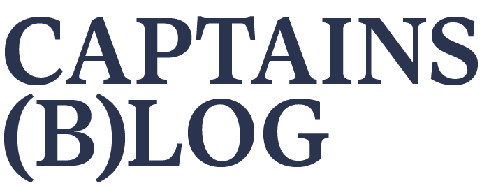 "CAPTAINS (B)LOG" text logo in navy blue.