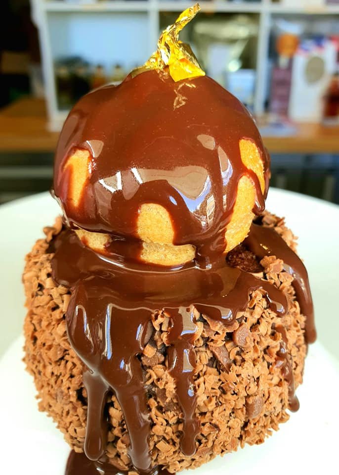 Chocolate truffle and profiterole with gold leaf.jpg