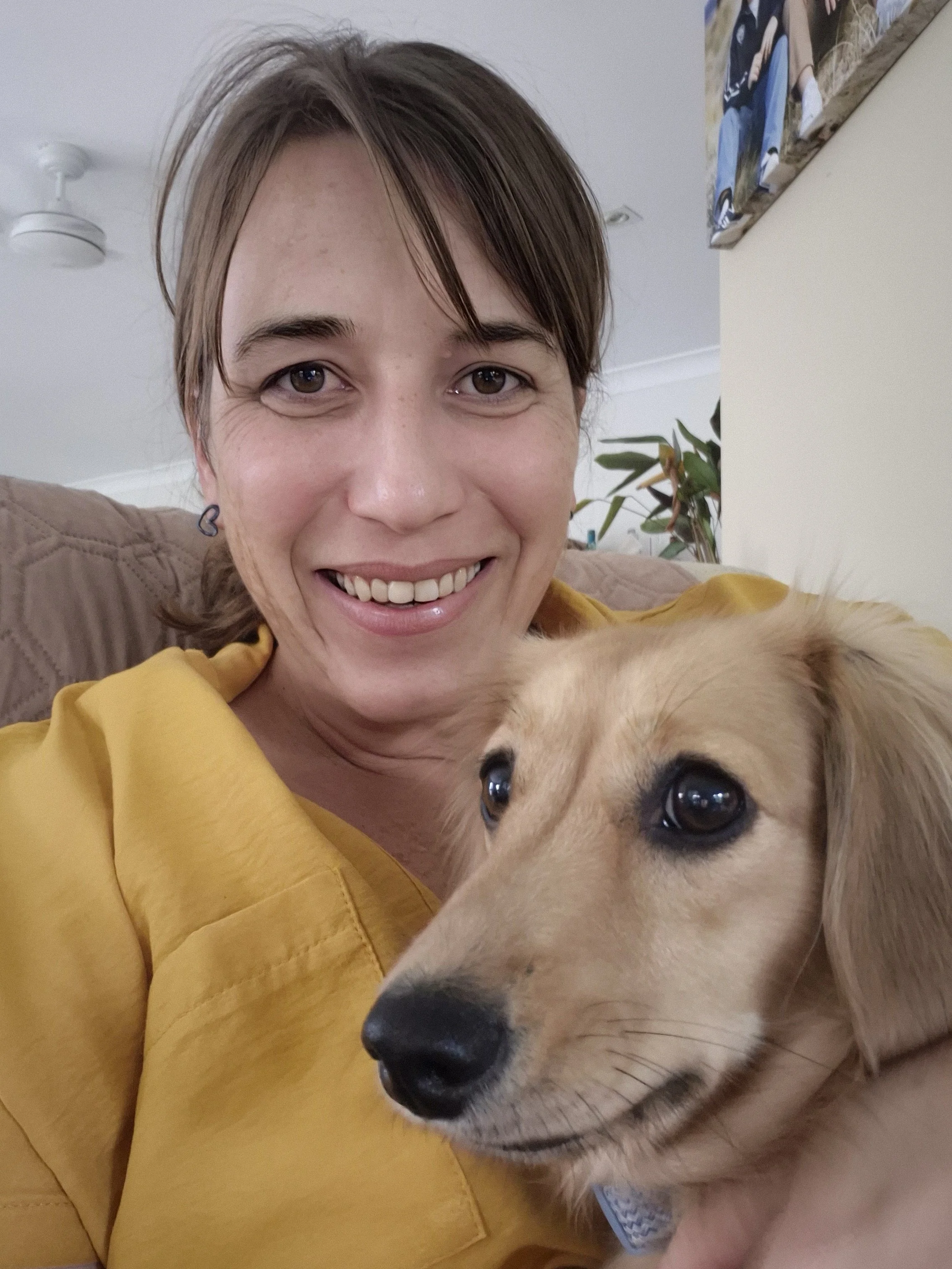 Picture of shannon with her niece dog, Mavis (Dachshund)