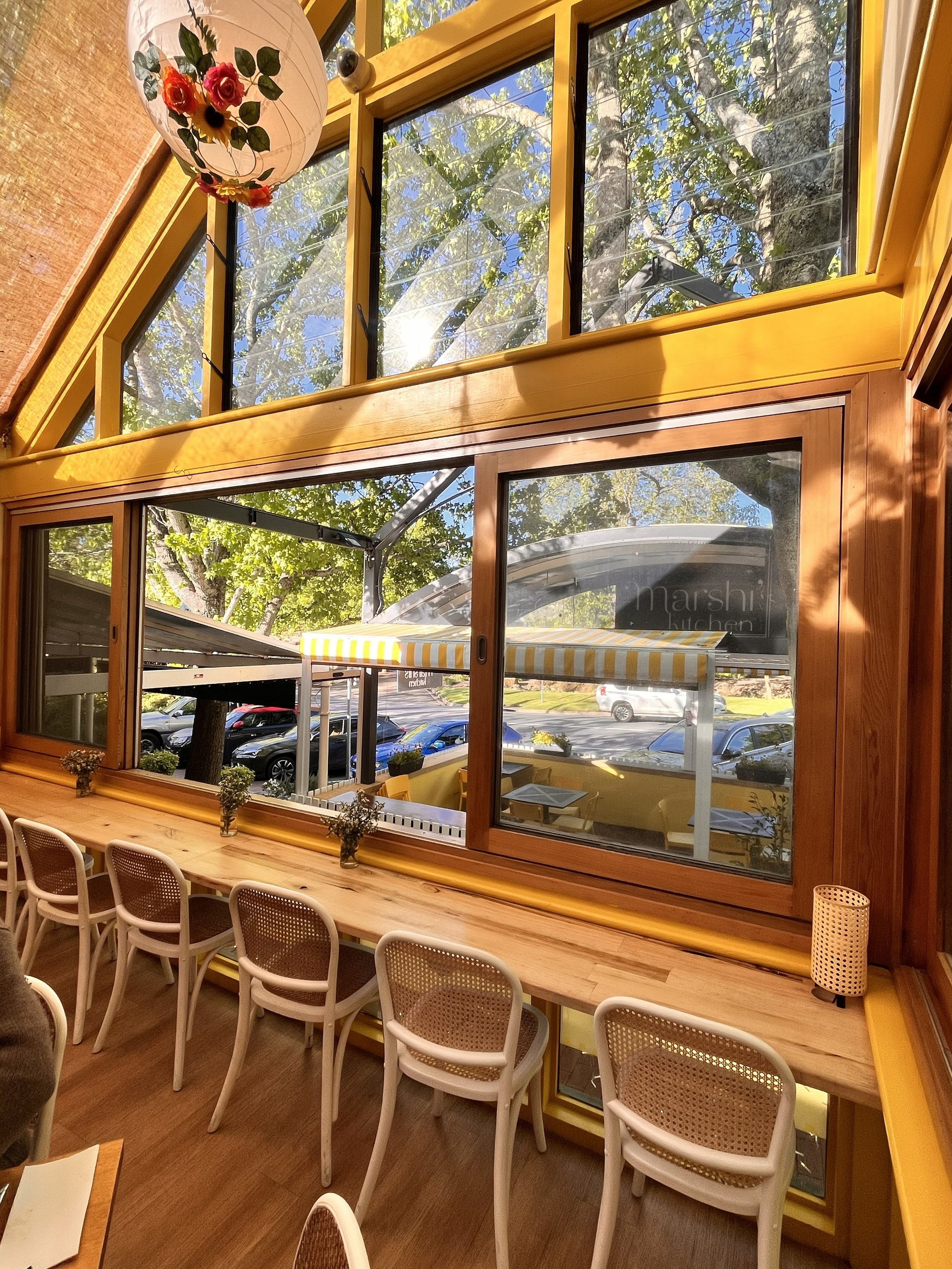 The front inside bench is a very popular spot for sipping our Toby's Estate coffee and watching the world go by.