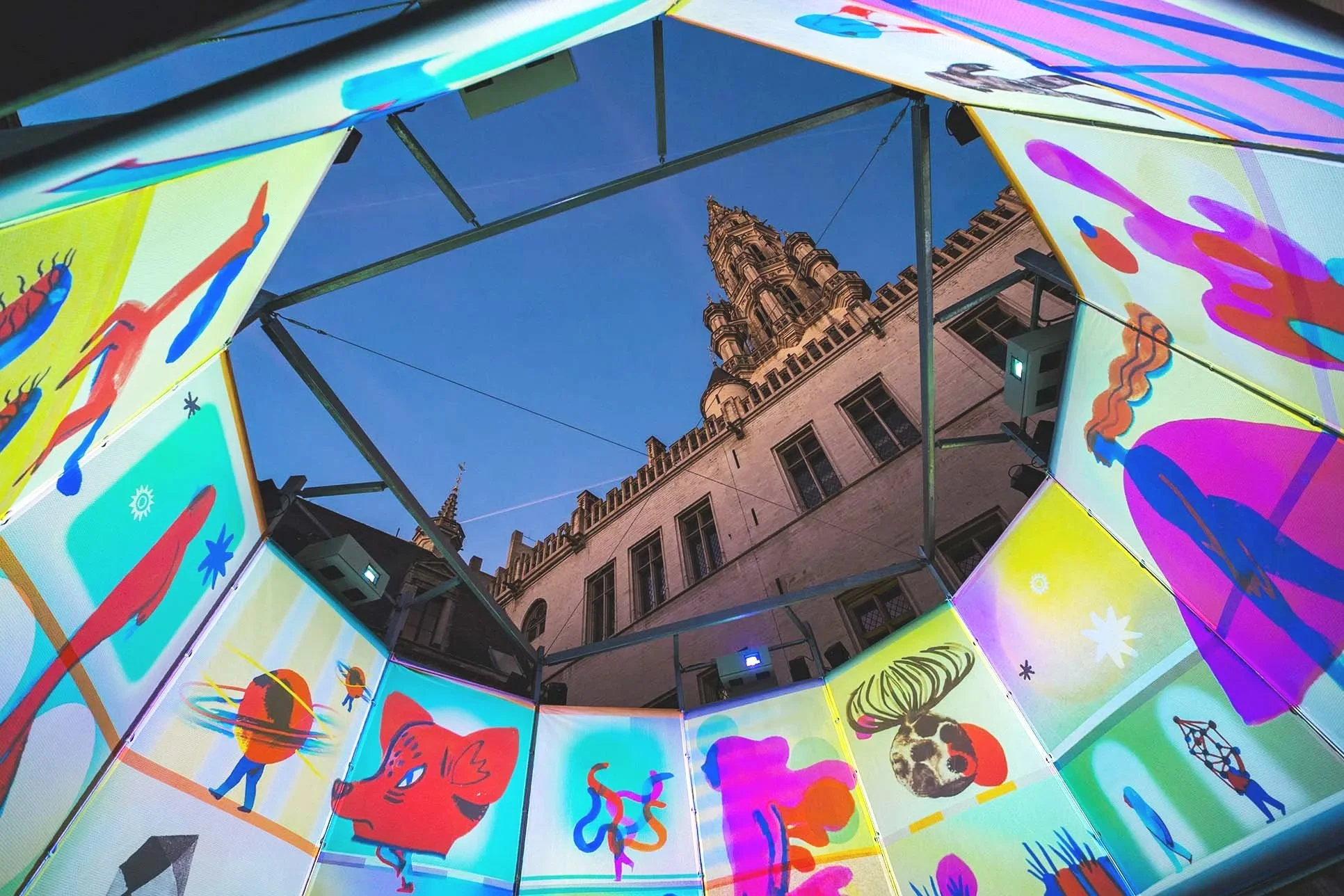 Morphosis monumental public art installation illuminated at night during a light festival.