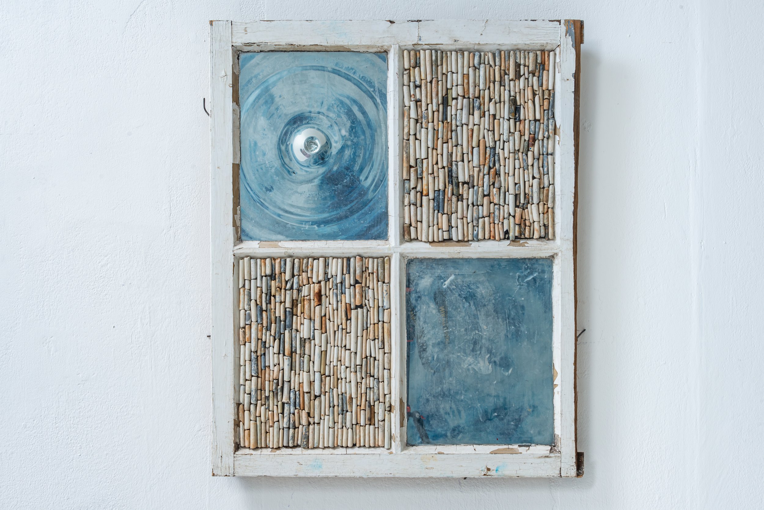 Intuitions of Unity, clay pipes within window sourced from the foreshore, 68 x 55 cm, £950.JPEG