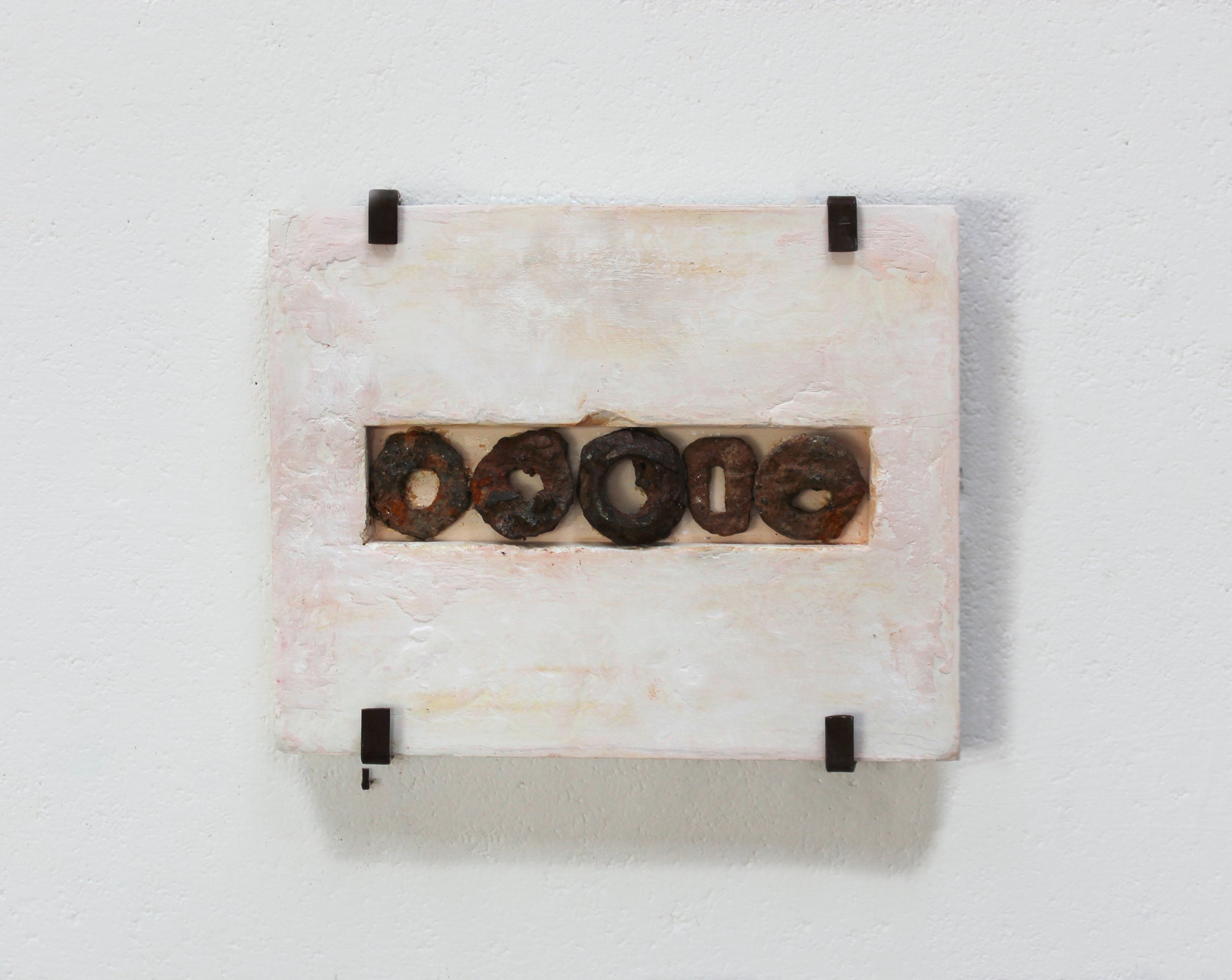 Georgie Mason 5_There amongst the rubble_rusty objects embedded in plaster with iron display mount_19 x 27cm_£700.jpg