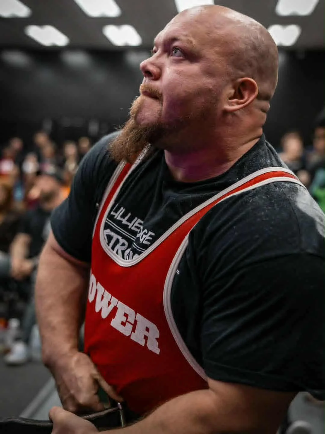 Event flyer for the World Powerlifting Championship 2025, organized by the Raw Powerlifting Federation India, featuring pictures of Mr. Jagpreet Singh Captain and Mr. Marcus Griffiths Lady Griffiths, with details about the competition dates, venue, categories, and contact information, and illustrations of two tigers lifting barbells.