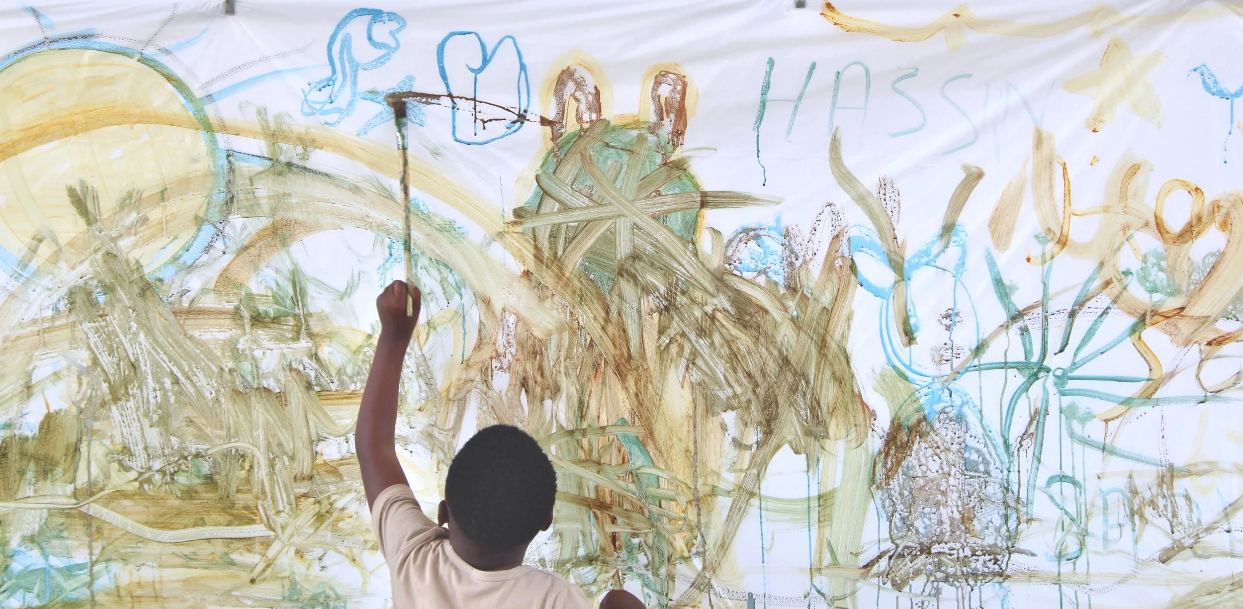 Solidarity Sisters by Davide Sozio, participatory painting workshops with women and children, 2026.