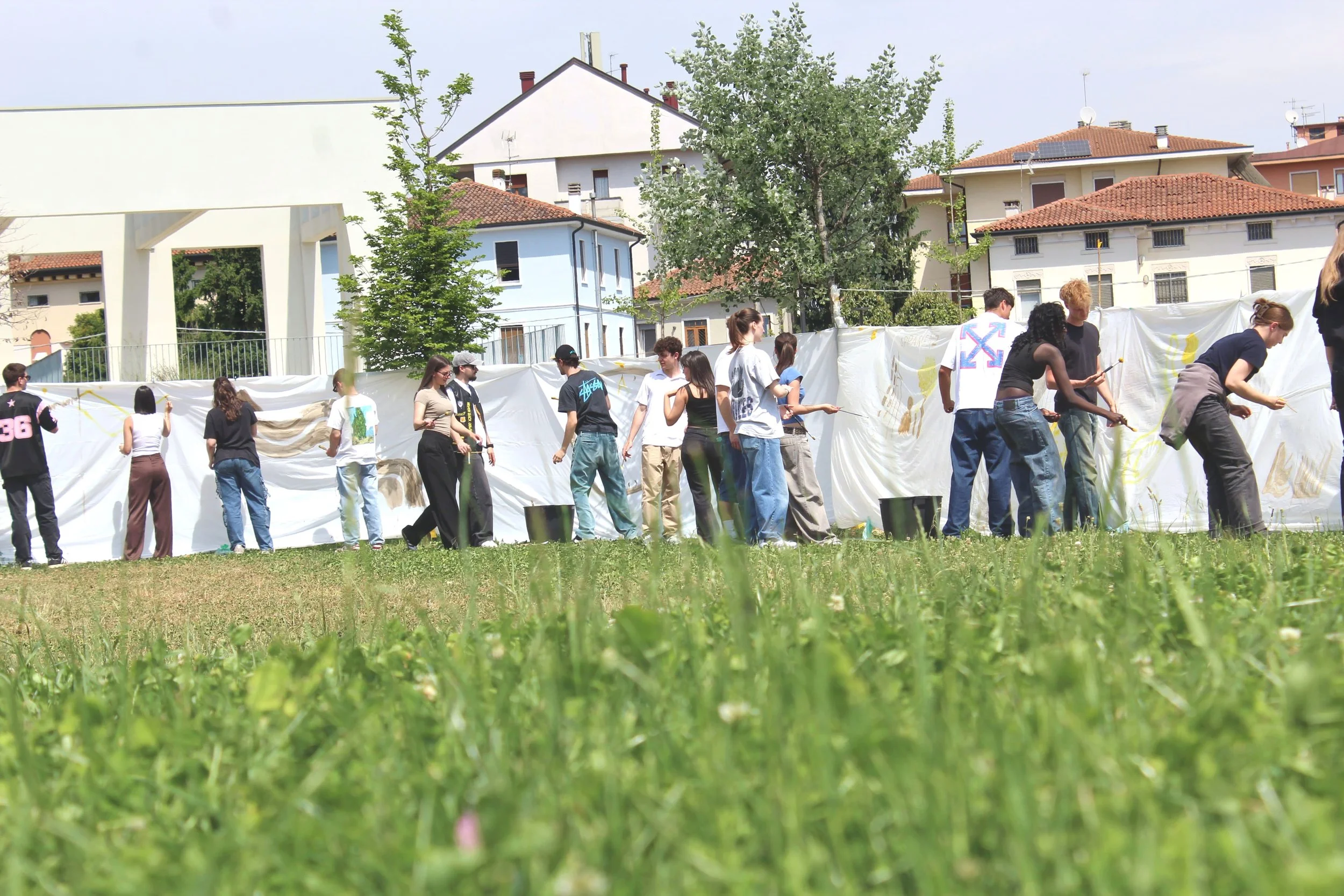 Fifteen Thousand Steps by Davide Sozio, a participatory art project with IUAV University of Venice, 2026 - workshop participants painting.