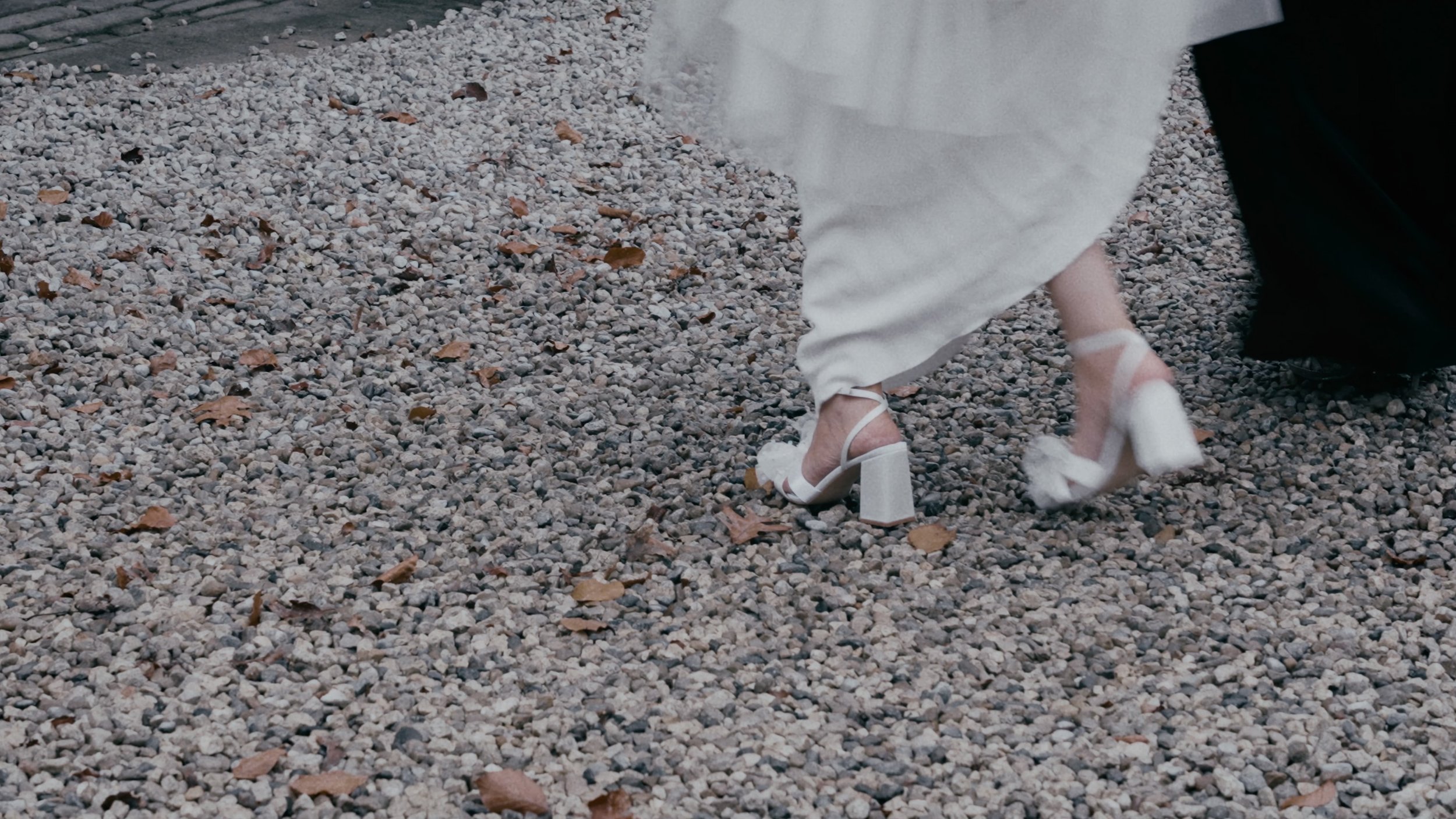 brides shoes whilst walking on gravel