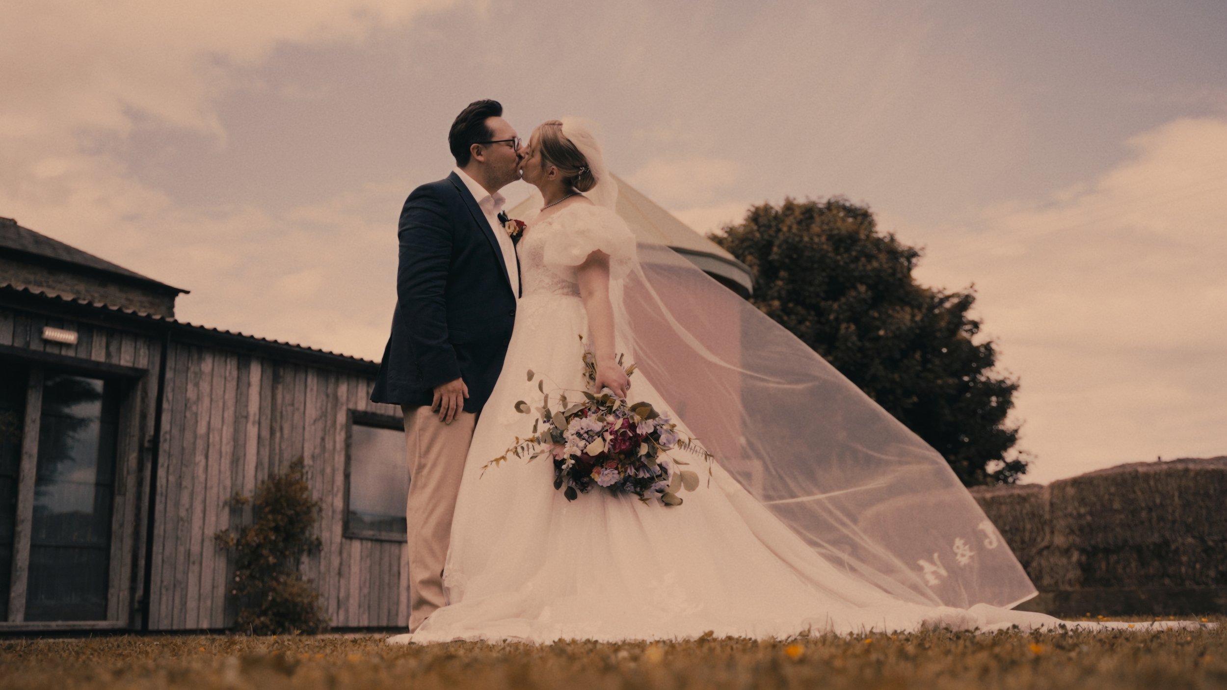 bride and groom kissing