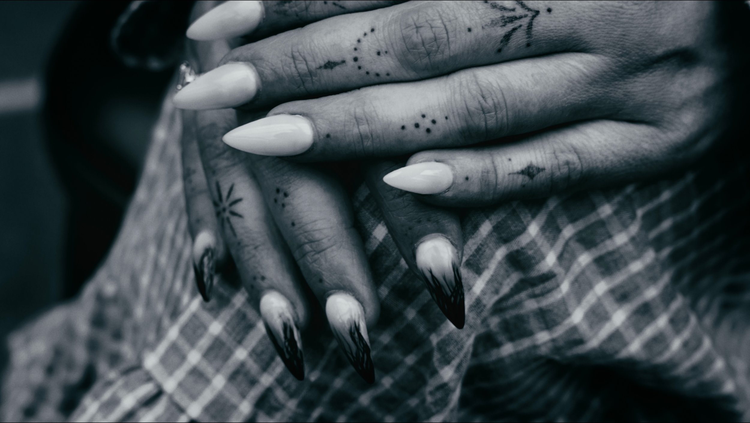 close up of brides nails in black and white