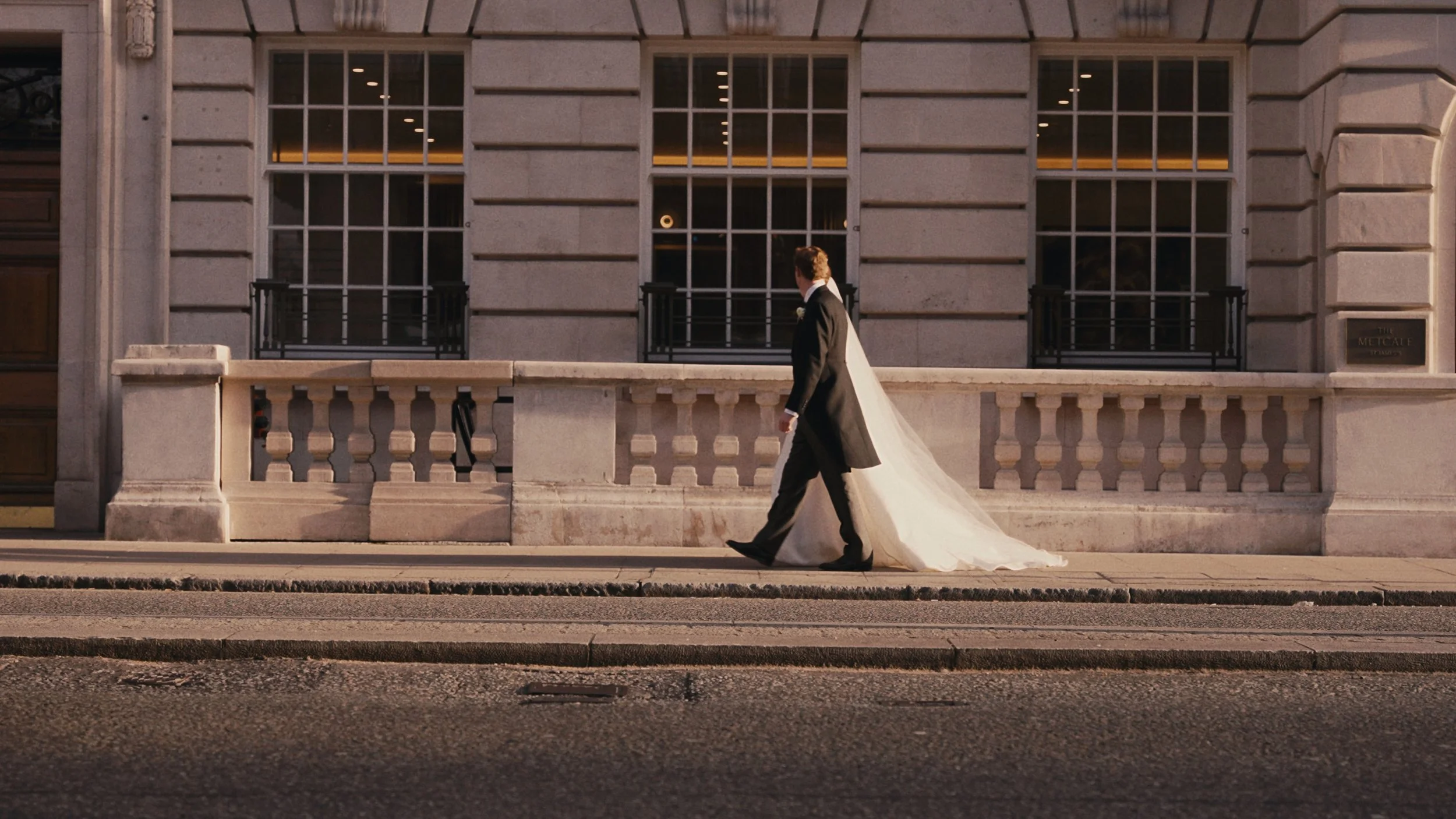 Bride and groom walking in London