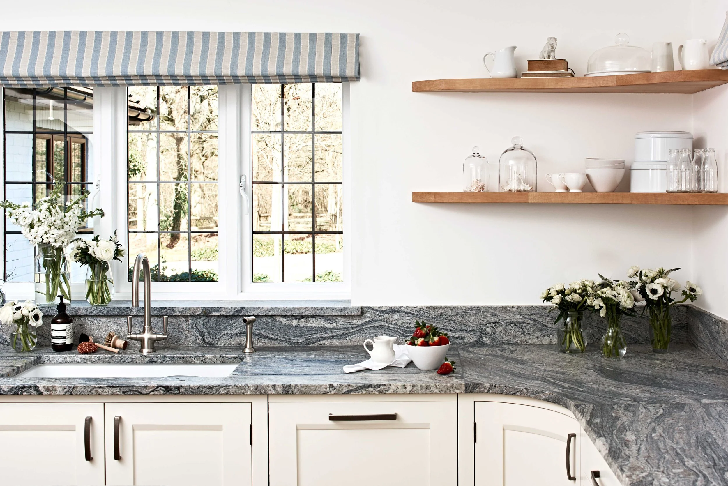 sink detail with straberries and cream jug in bespoke Surrey country kitchen