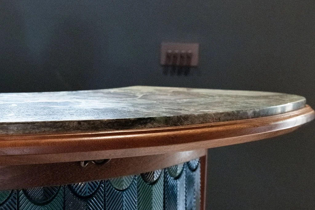 Curved handmade bar in Iroko timber with Brazilian granite and Turkish leaf tiles, Surrey