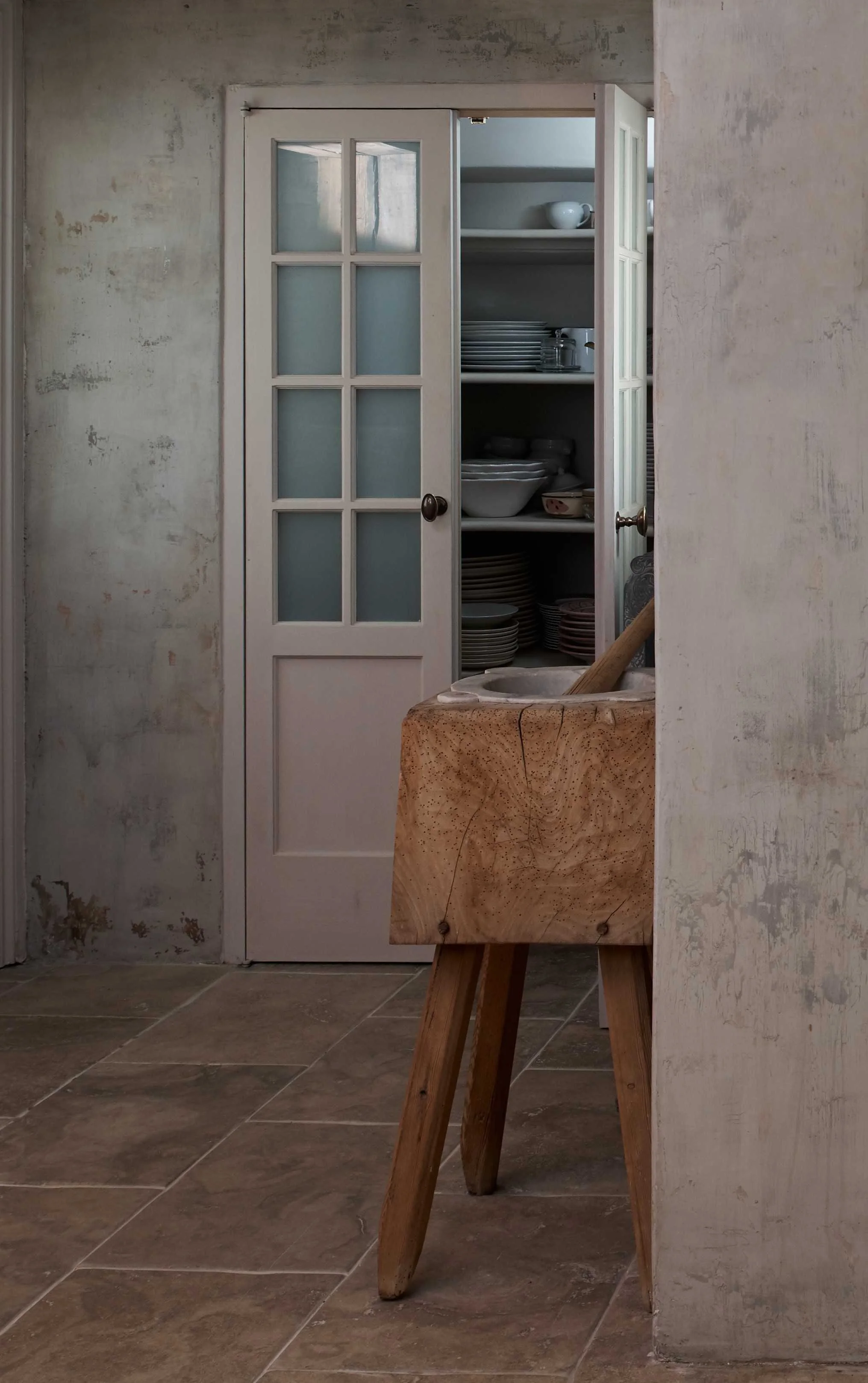 Handmade under-stairs cupboard for crockery in bespoke Surrey kitchen.