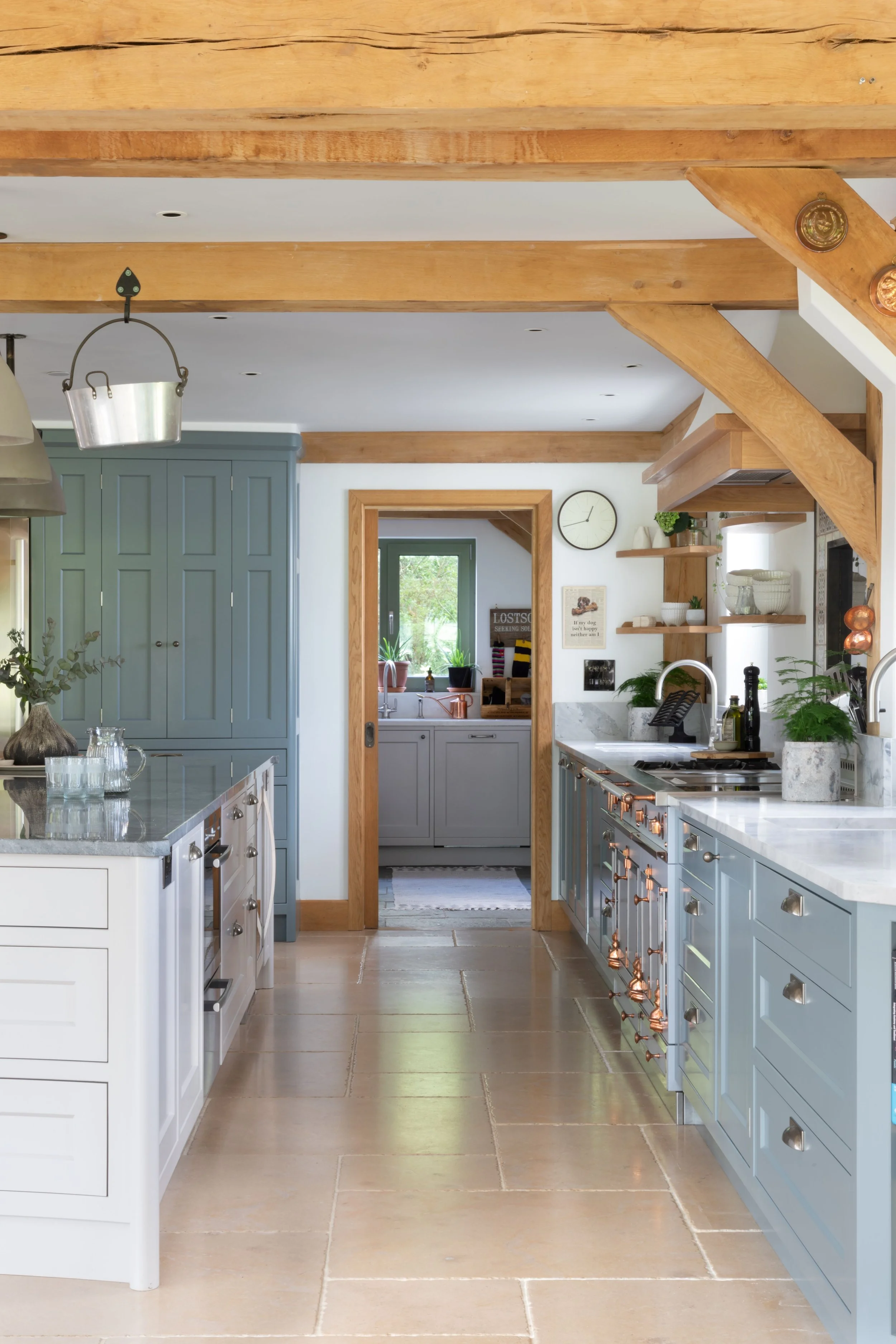 Contemporary Surrey kitchen with handmade green oak cabinetry and ancillary kitchen.