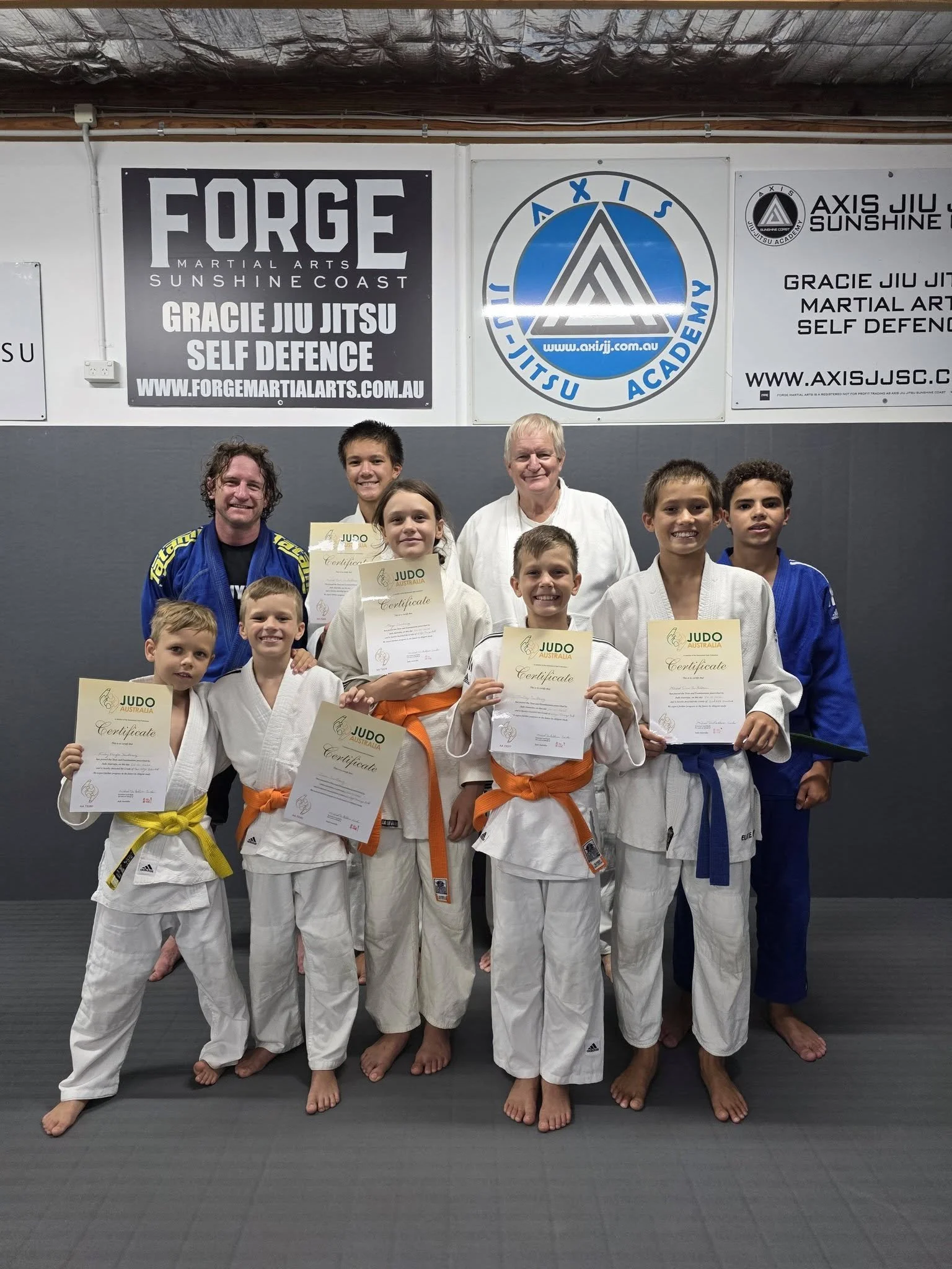 Group photo of Judo Practitioners of all ages.