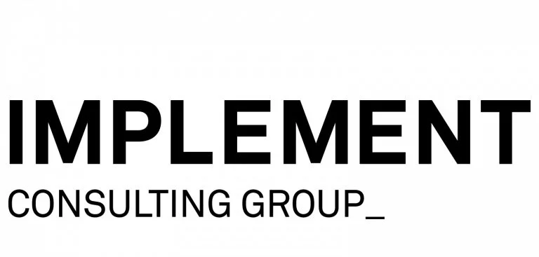 Logo with the words "IMPLEMENT CONSULTING GROUP" in bold black letters on a white background.