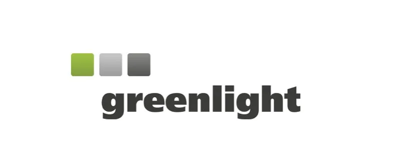 Logo with three squares in shades of green, gray, and black above the text 'greenlight' in bold black letters.