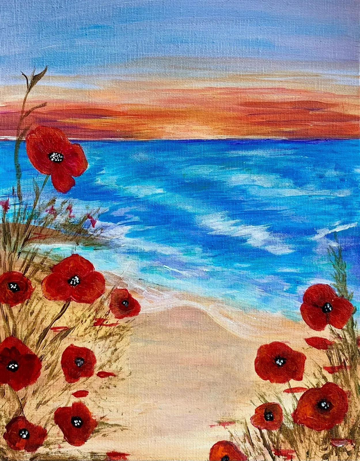 Thursdays' Paint & Sip in Chania City. Painting a sunset beach scene with red blossoms. 