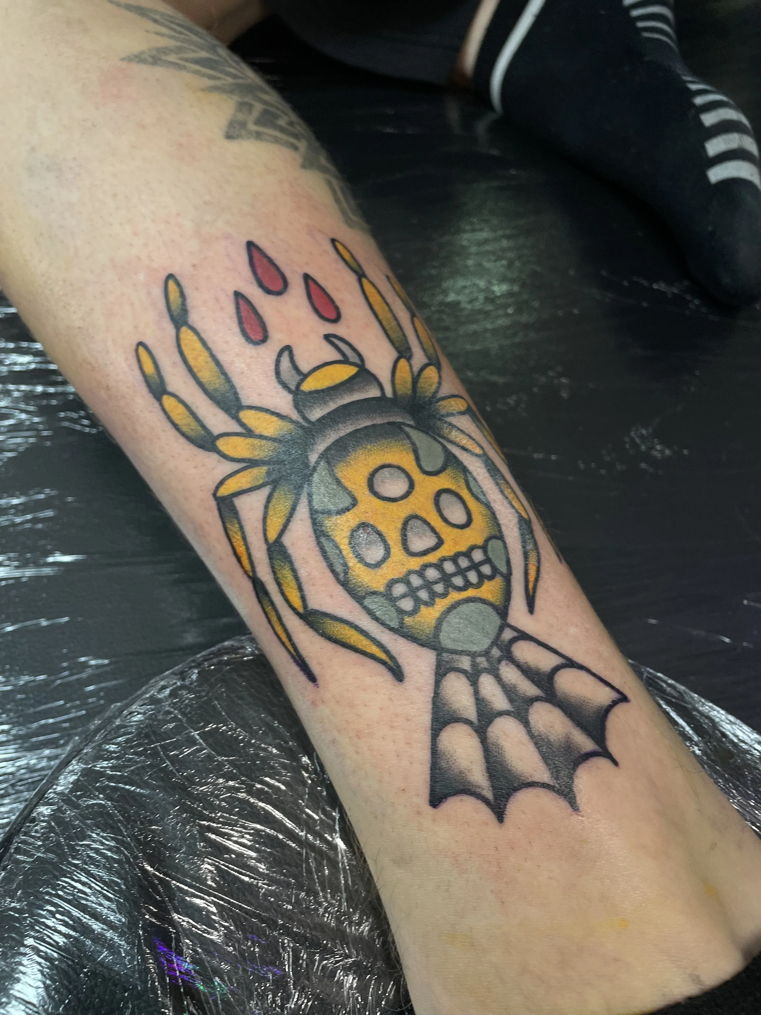 Traditional spider tattoo color.jpeg