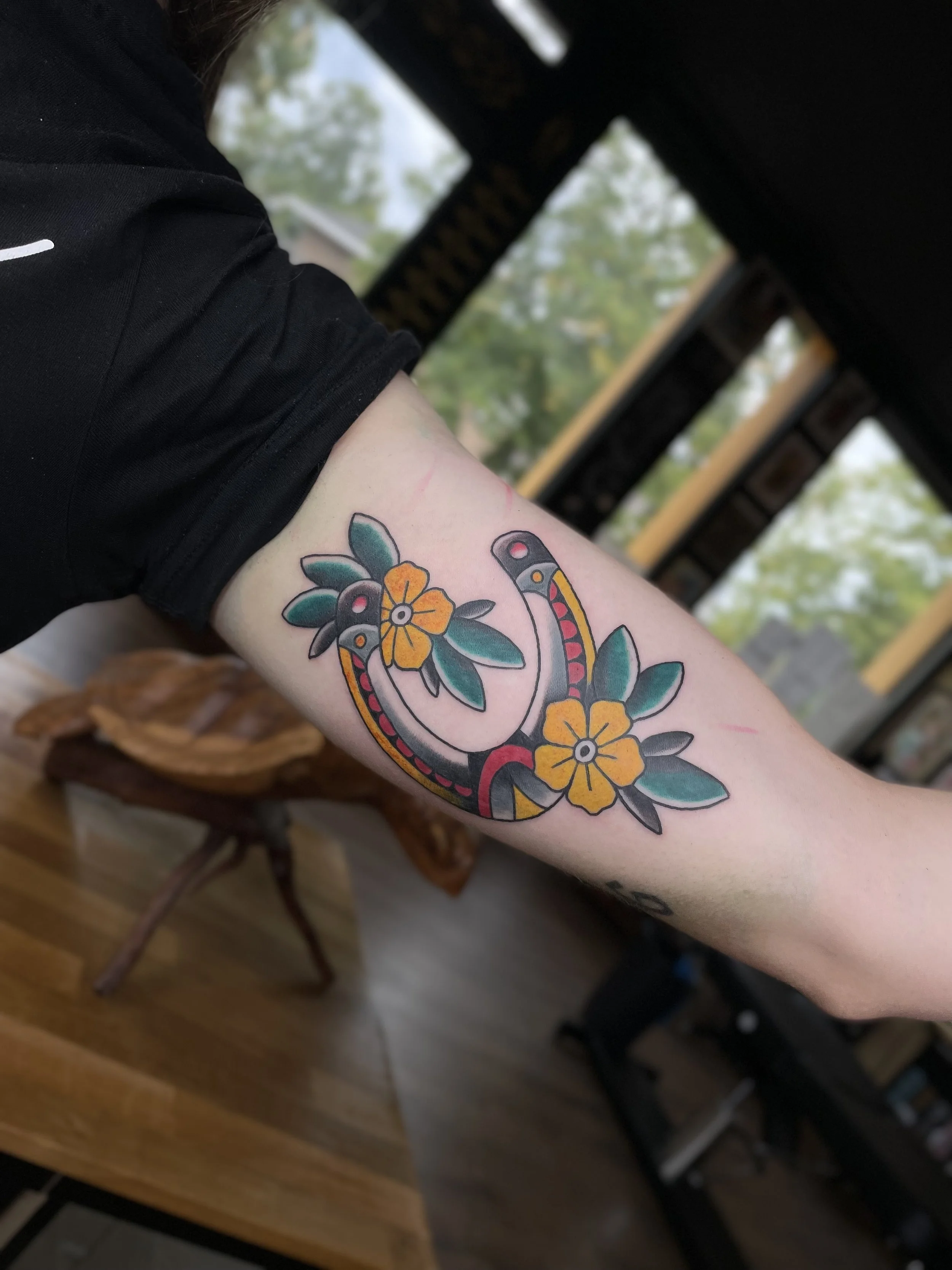 Traditional horseshoe tattoo color.jpeg