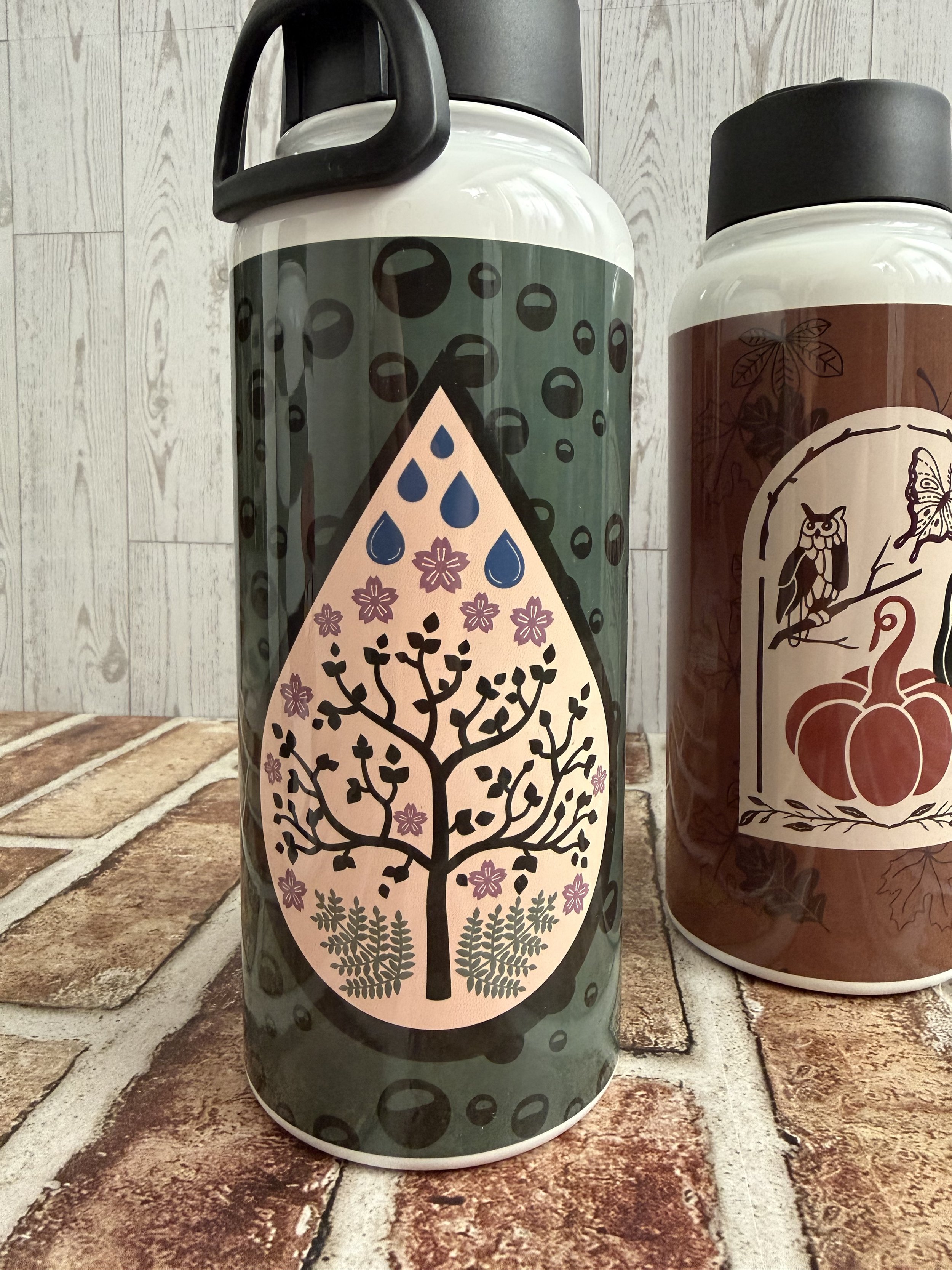 Spring water bottle with raindrops flowers and ferns.jpeg