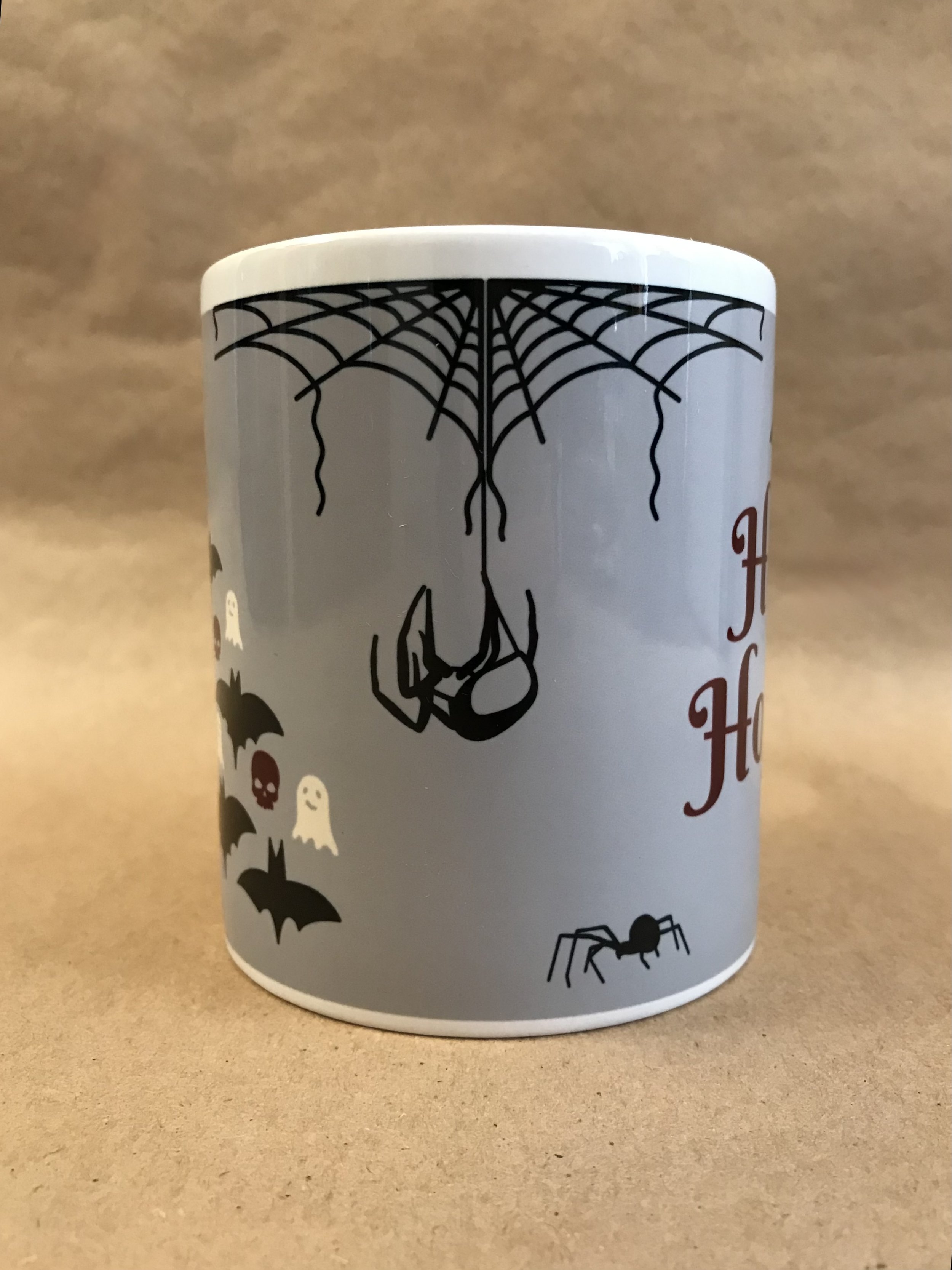 Bat Mug side view hanging spider.jpeg