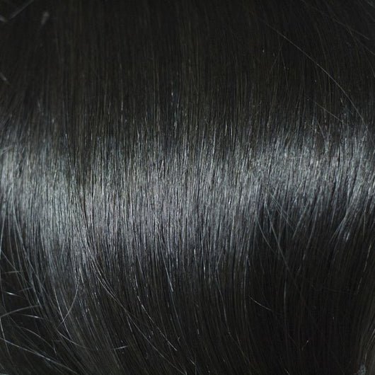 Close-up of black, shiny human hair
