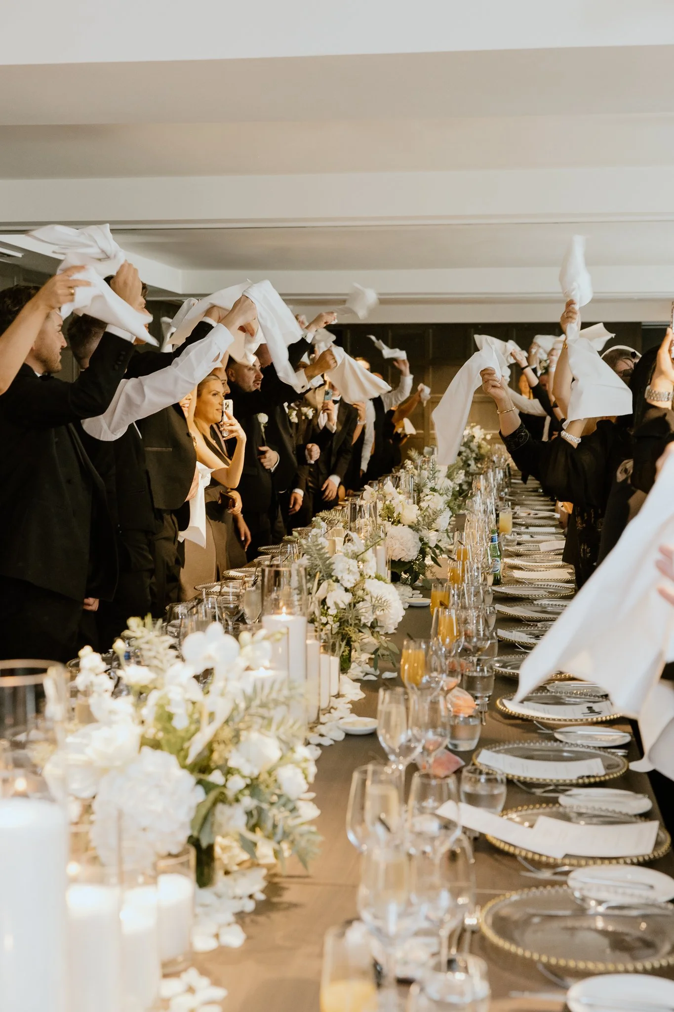 Napkings flowing during bride and groom entrance 