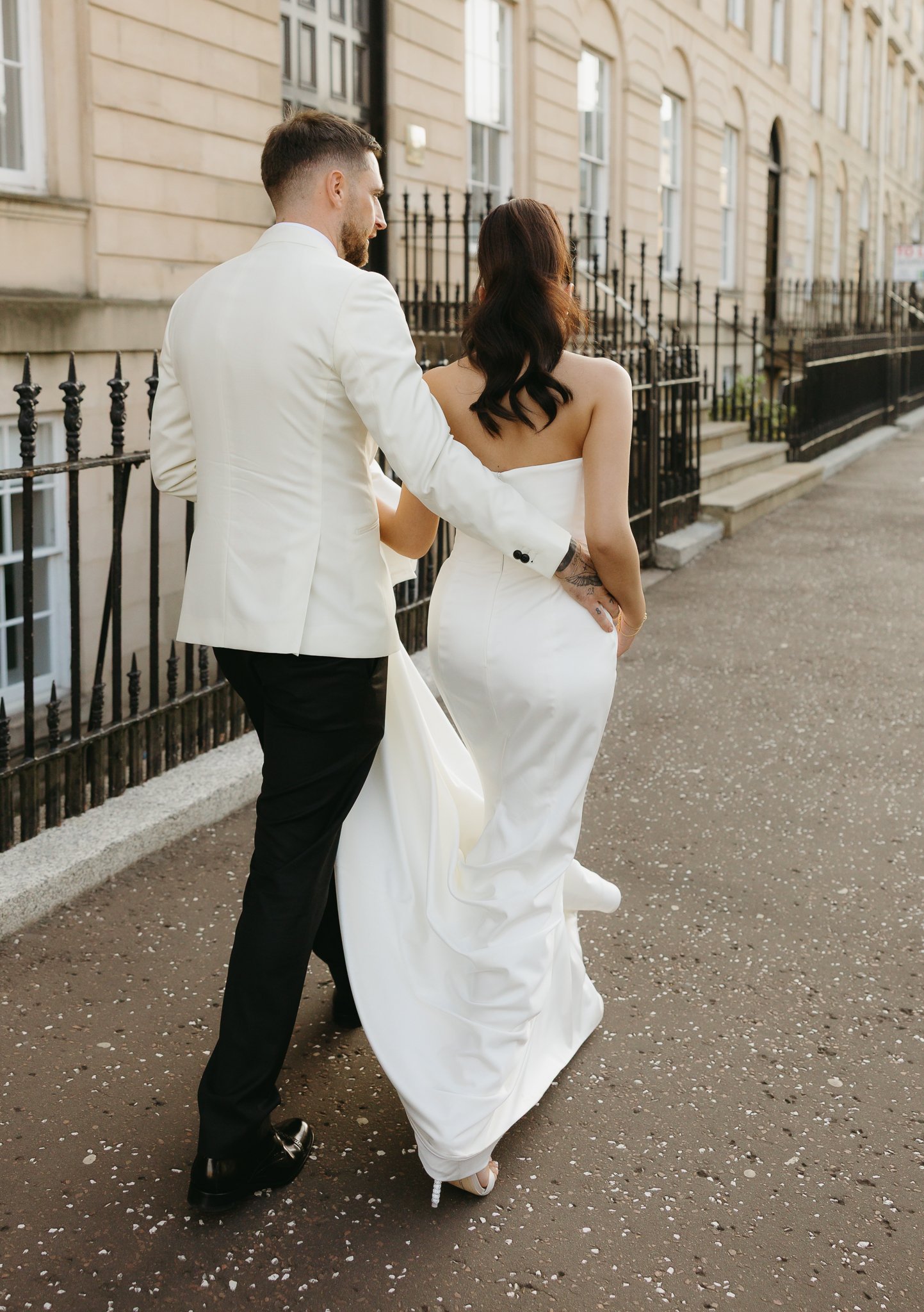 Candid photo of the couple walking