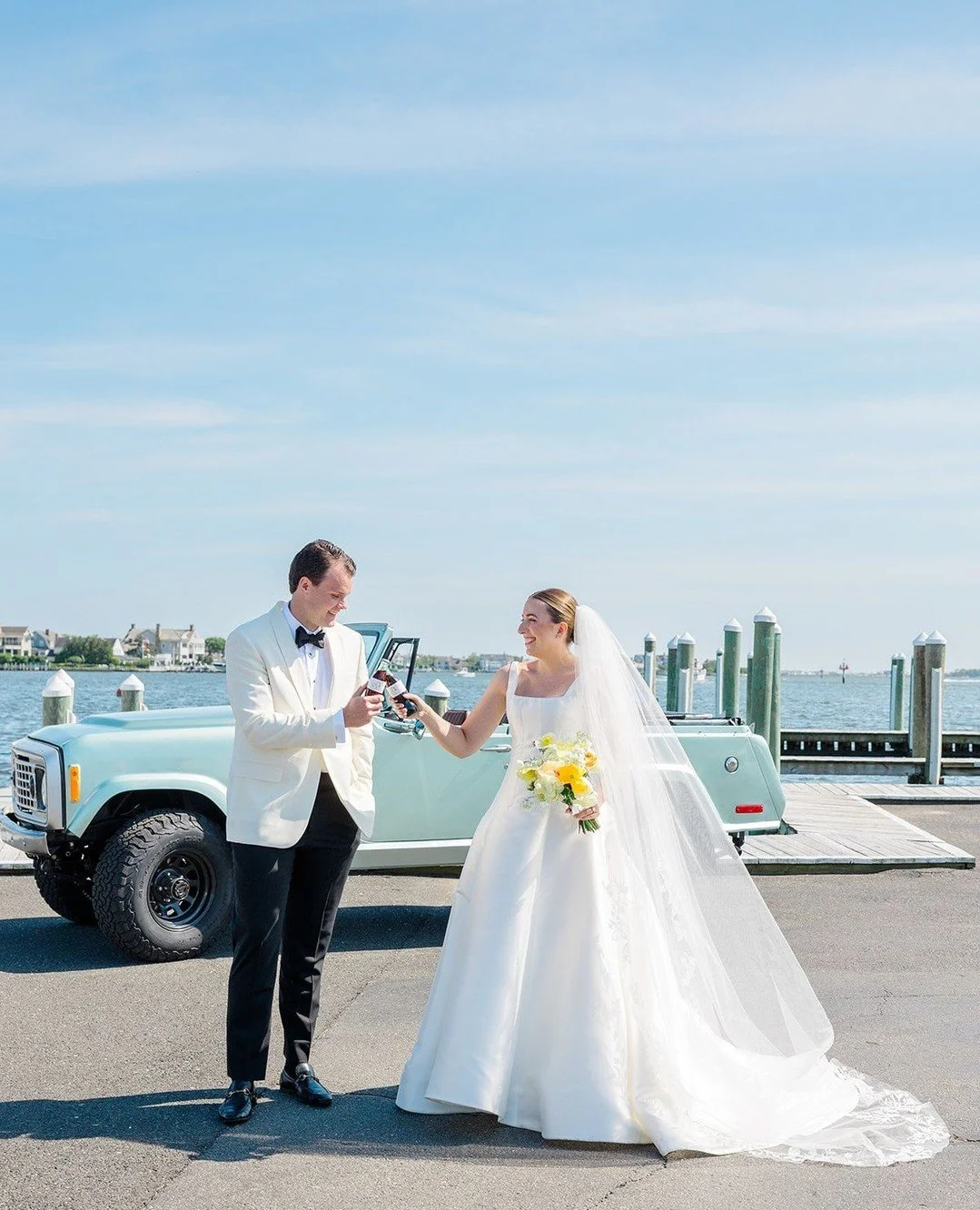 A little custom, Diet Coke cheers to start your seaside nuptials off right. L+T knew exactly what would make their day feel authentically them 🥤⁠
⁠
Planning + Design | @gildedlilyevents⁠
Photography | @jessaschifilliti⁠
Florist | @cassandrashahflowe