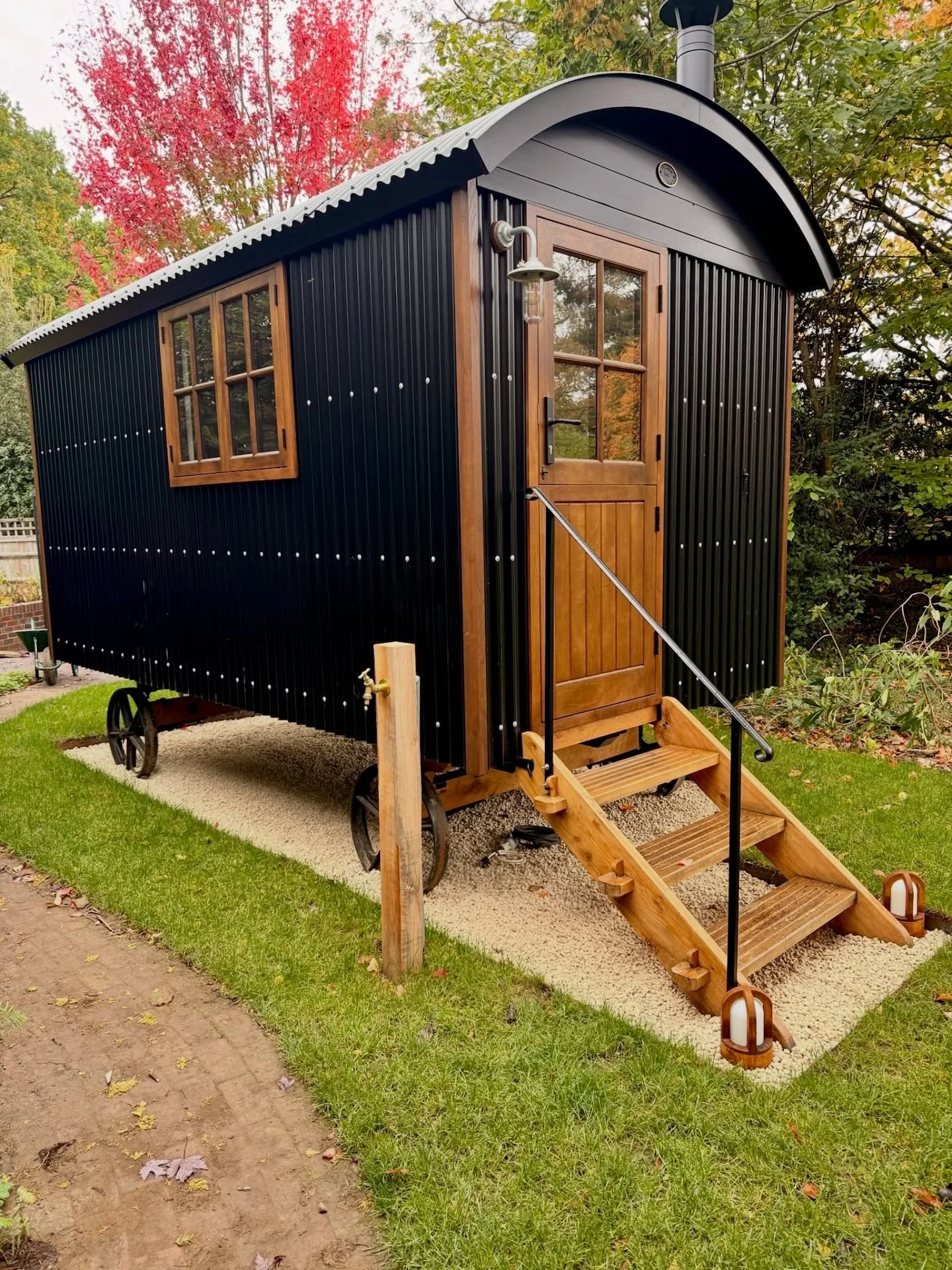 A new Shepherd&rsquo;s Hut for one of our clients &mdash; built by @blackdownshepherdhuts and now nestled into its setting.
⁠
Our team handled the surrounding landscaping and awaiting planting to help the hut sit naturally within the garden.
⁠
#Langd